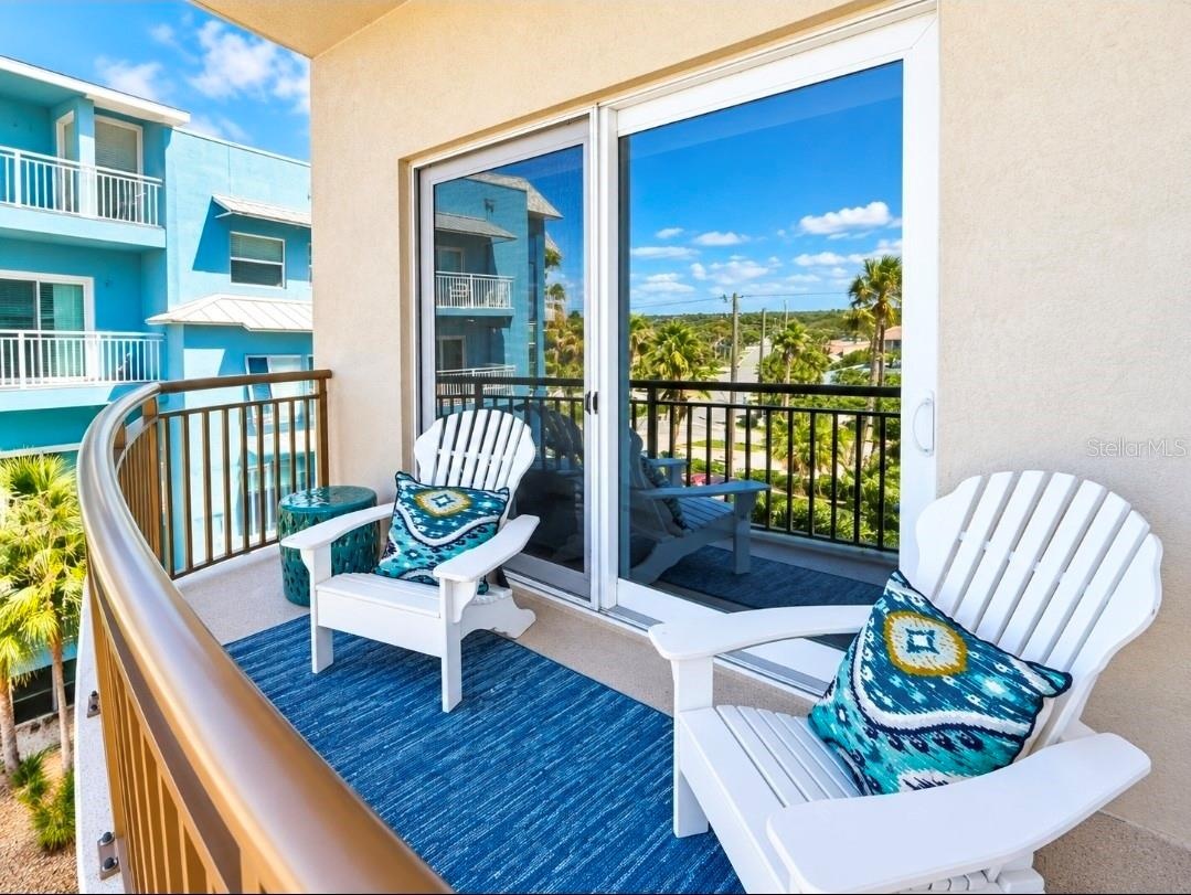 PRIMARY WEST BEDROOM SUITE BALCONY.Vew towards Estuary