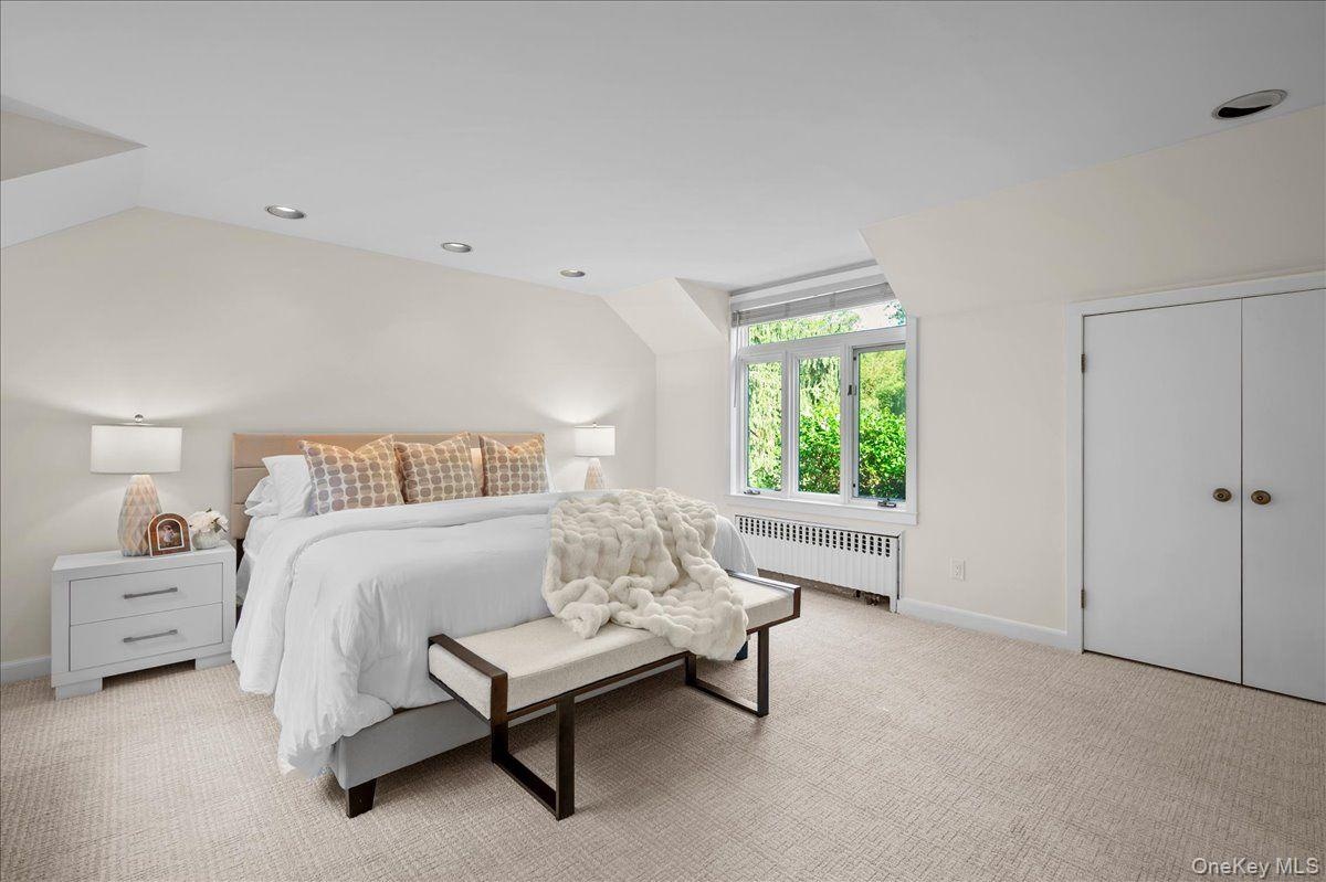 The primary bedroom is conveniently located on the first floor of the home.