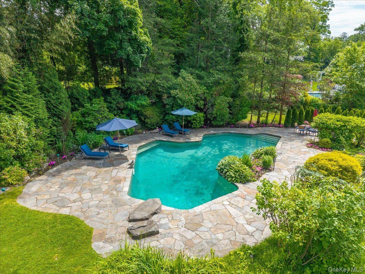 The property features an in-ground heated pool, perfect for entertaining!
