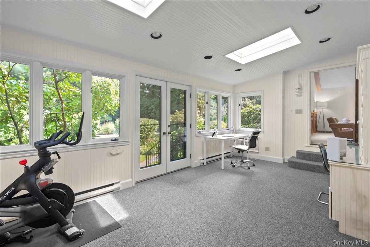 This flex space is the perfect spot for an office, gym, playroom, or pool room. It's conveniently located on the first floor with plenty of natural li
