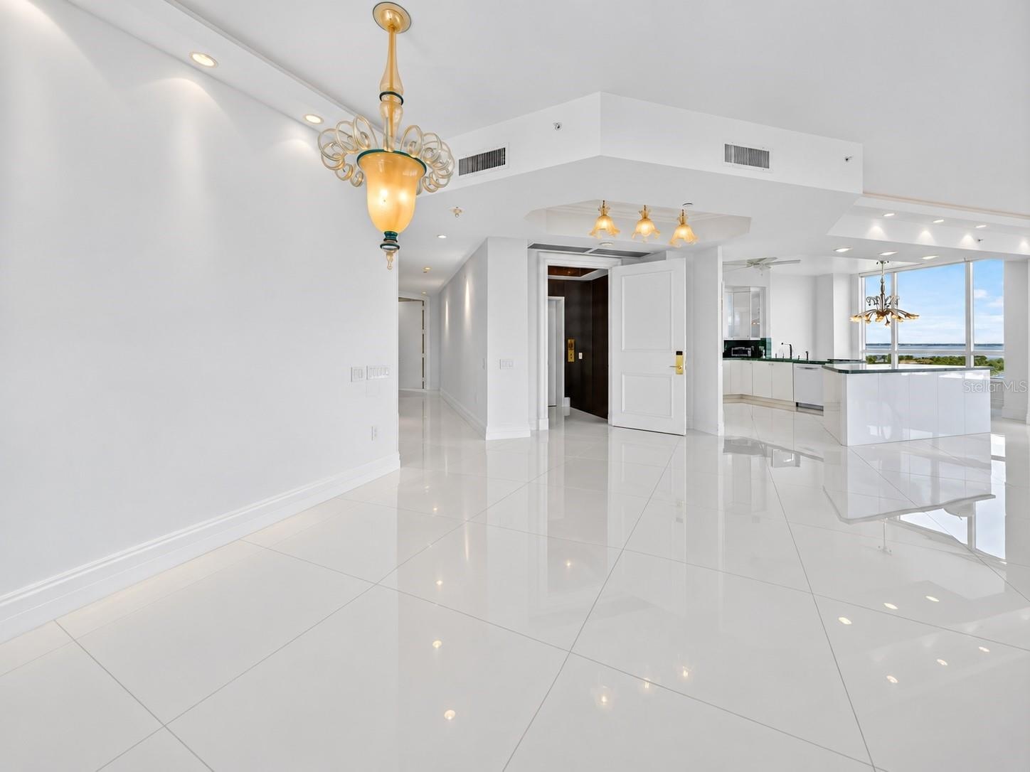 Den looking into living room and foyer