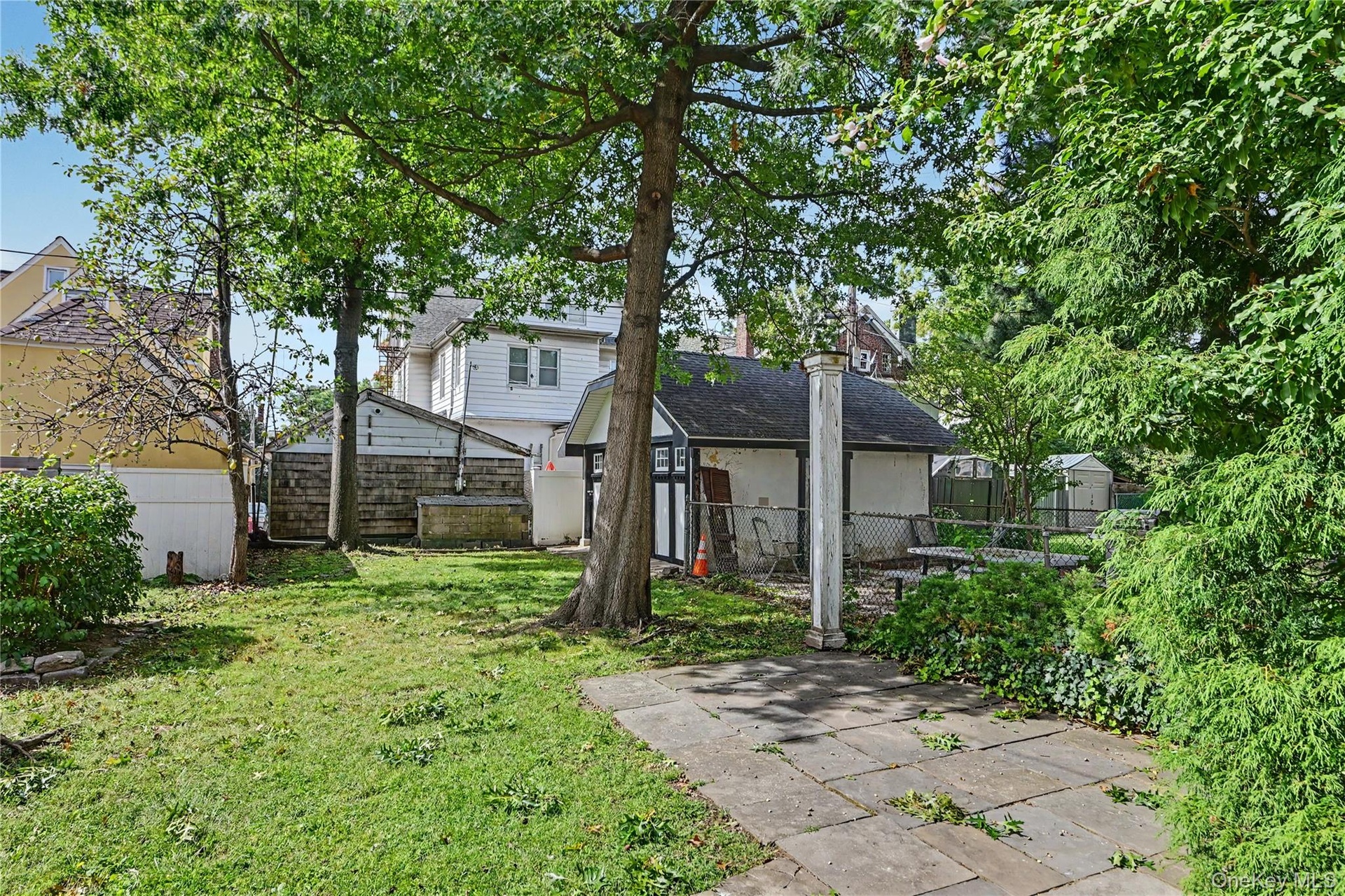 View of yard and Non Car Garage