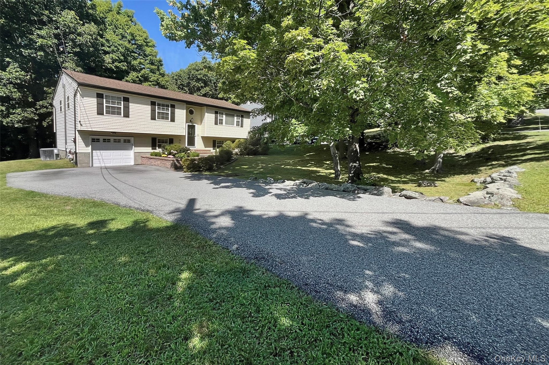 with sizable driveway