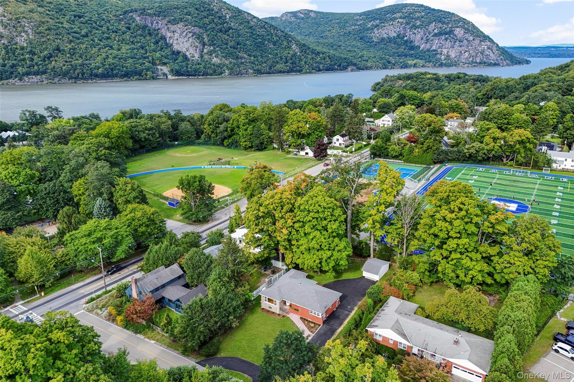 View of the house, sports fields and the Hudson River  and the Hudson Highland mountains from the air
