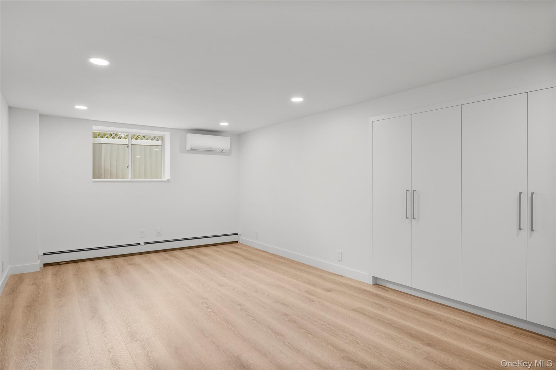 Bonus room on lower level with three large closets
