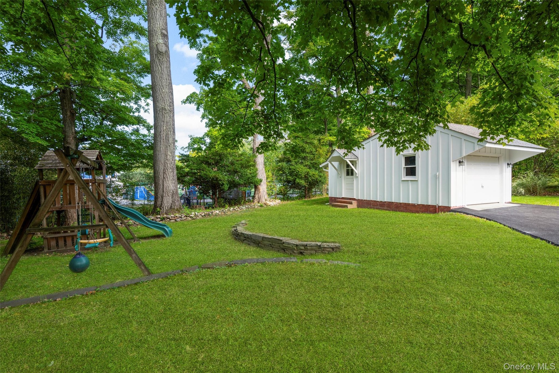 Back yard, playground and garage
