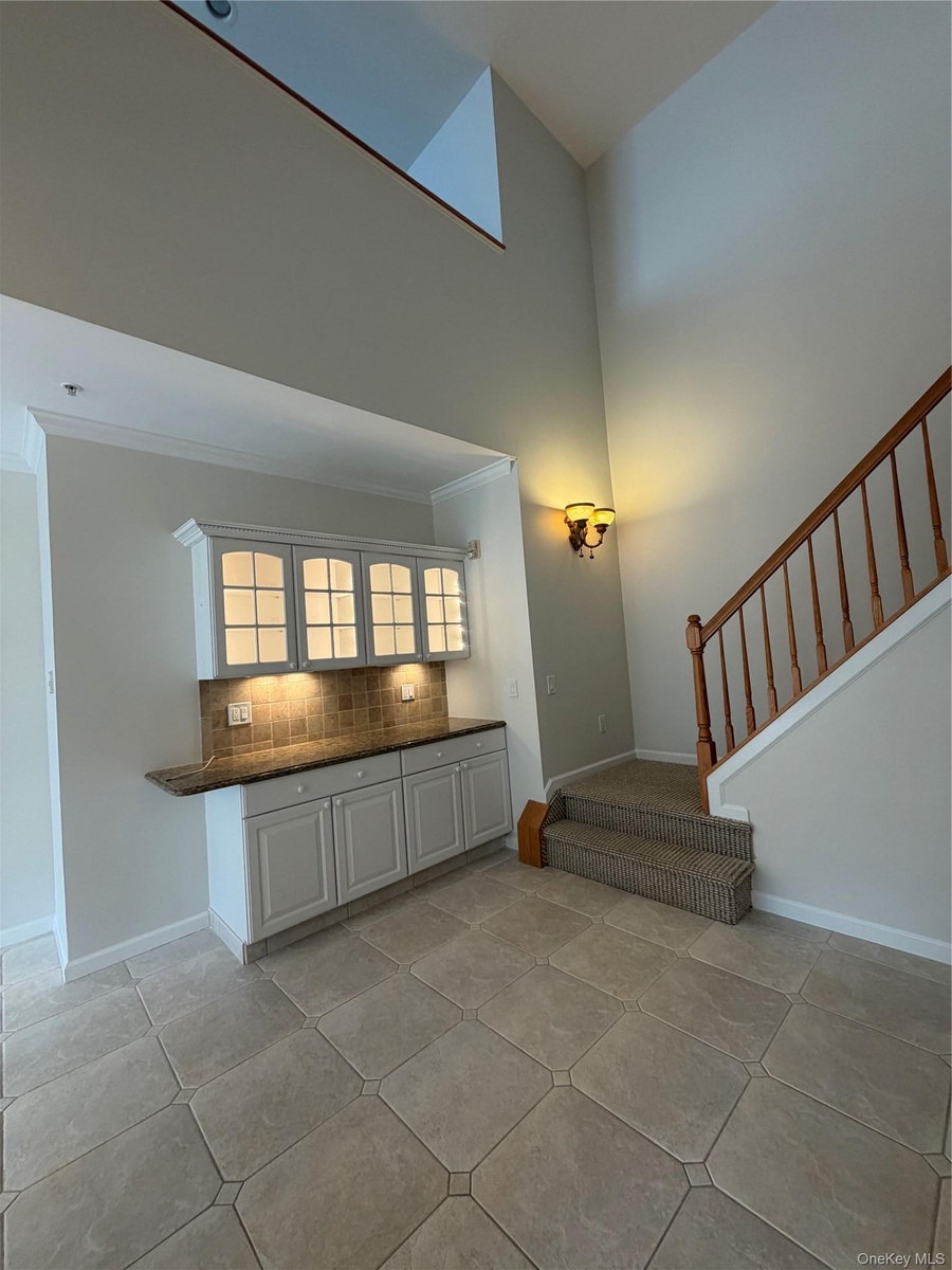 Granite glass, and more cabinets for a lovely breakfast area, bar, or serving counter