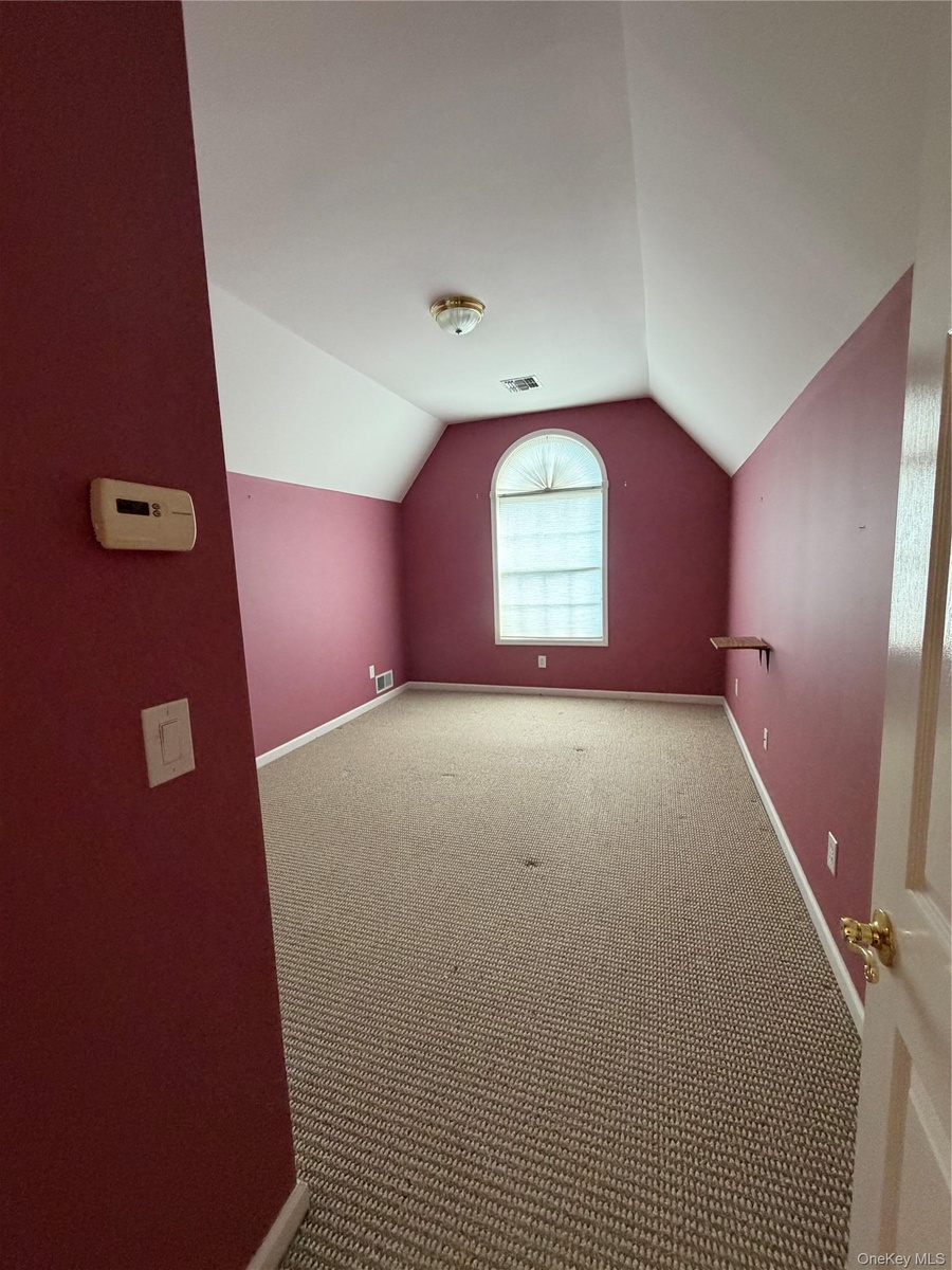 3rd bdrm upstairs, large arched window,