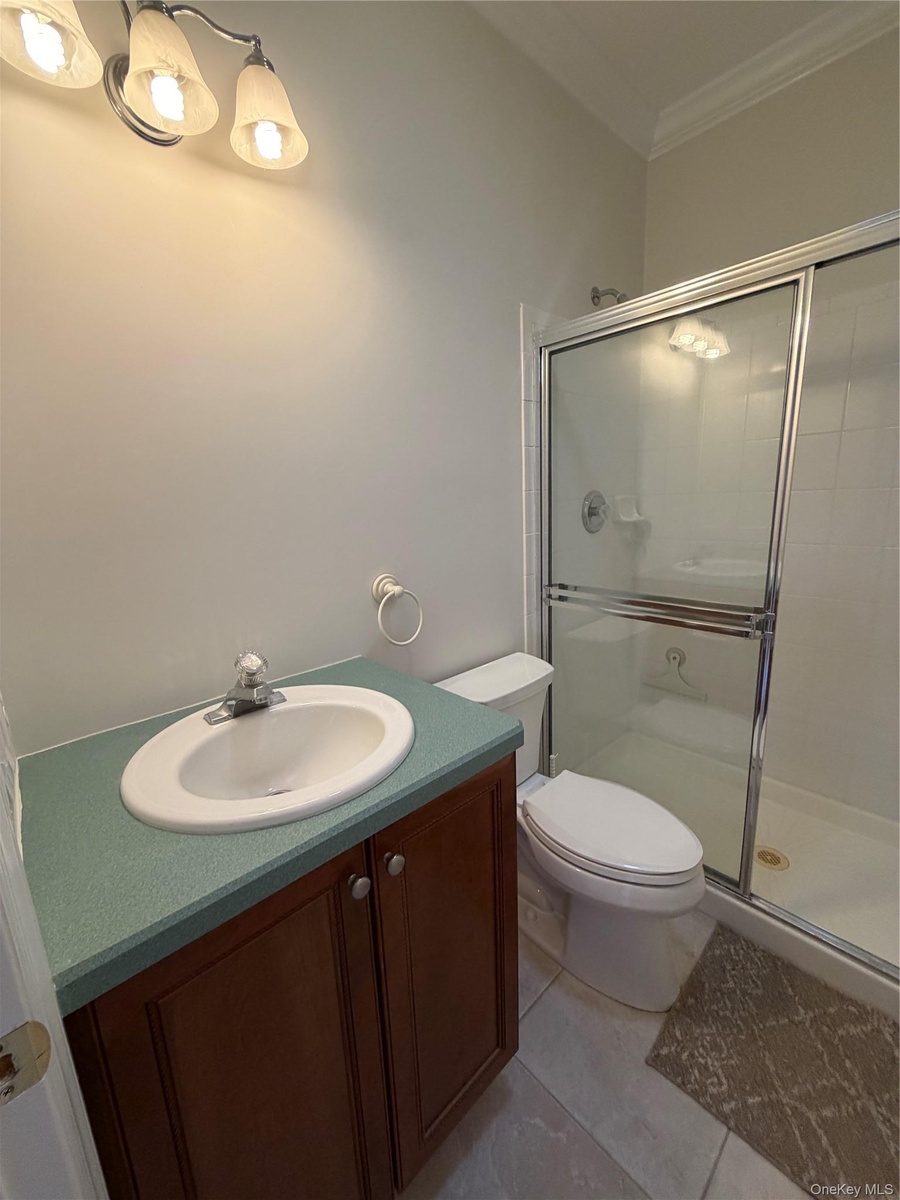 Hall bath, right off kitchen, 2nd bdrm, and garage