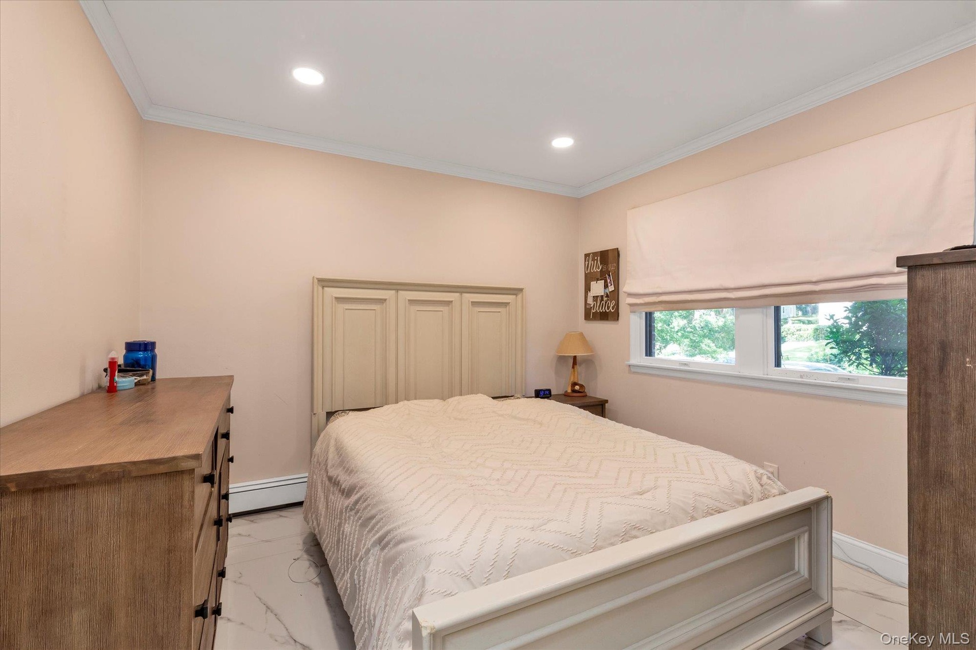 Perfect quest room or Mother-daughter with proper permits. Ground -level Bedroom #4 w/full bath on this level.Recessed ceiling lighting, crown molding