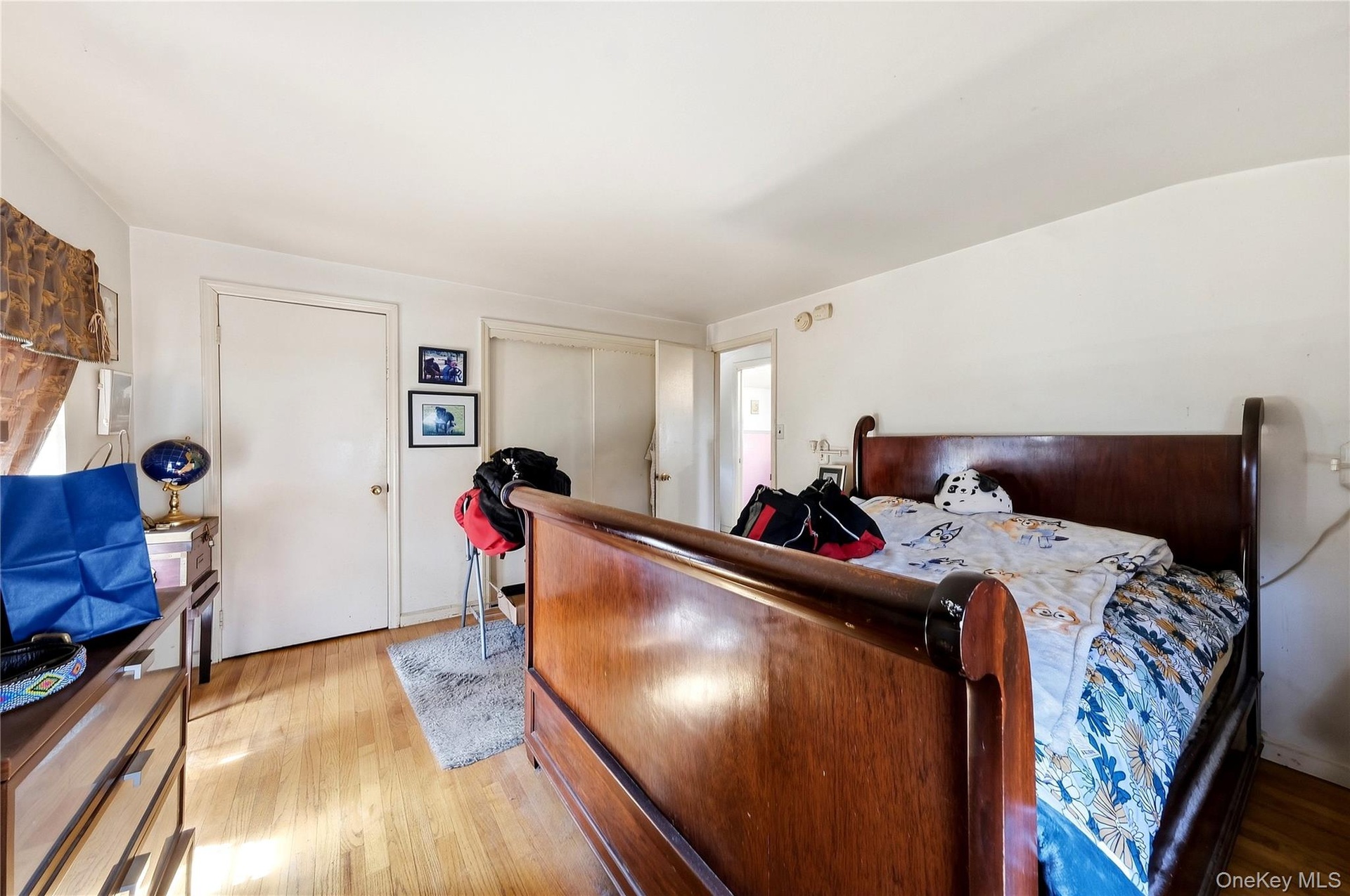 Bedroom with walk in closet and additional closet