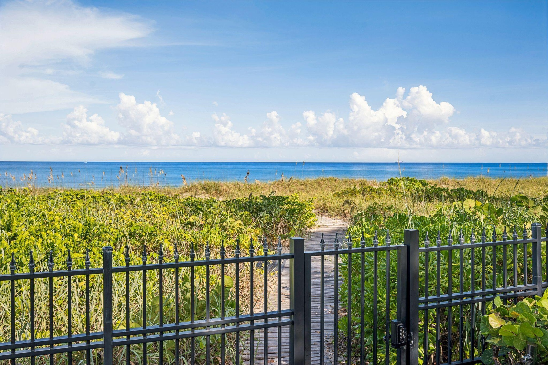 Private beach gate and boardwalk