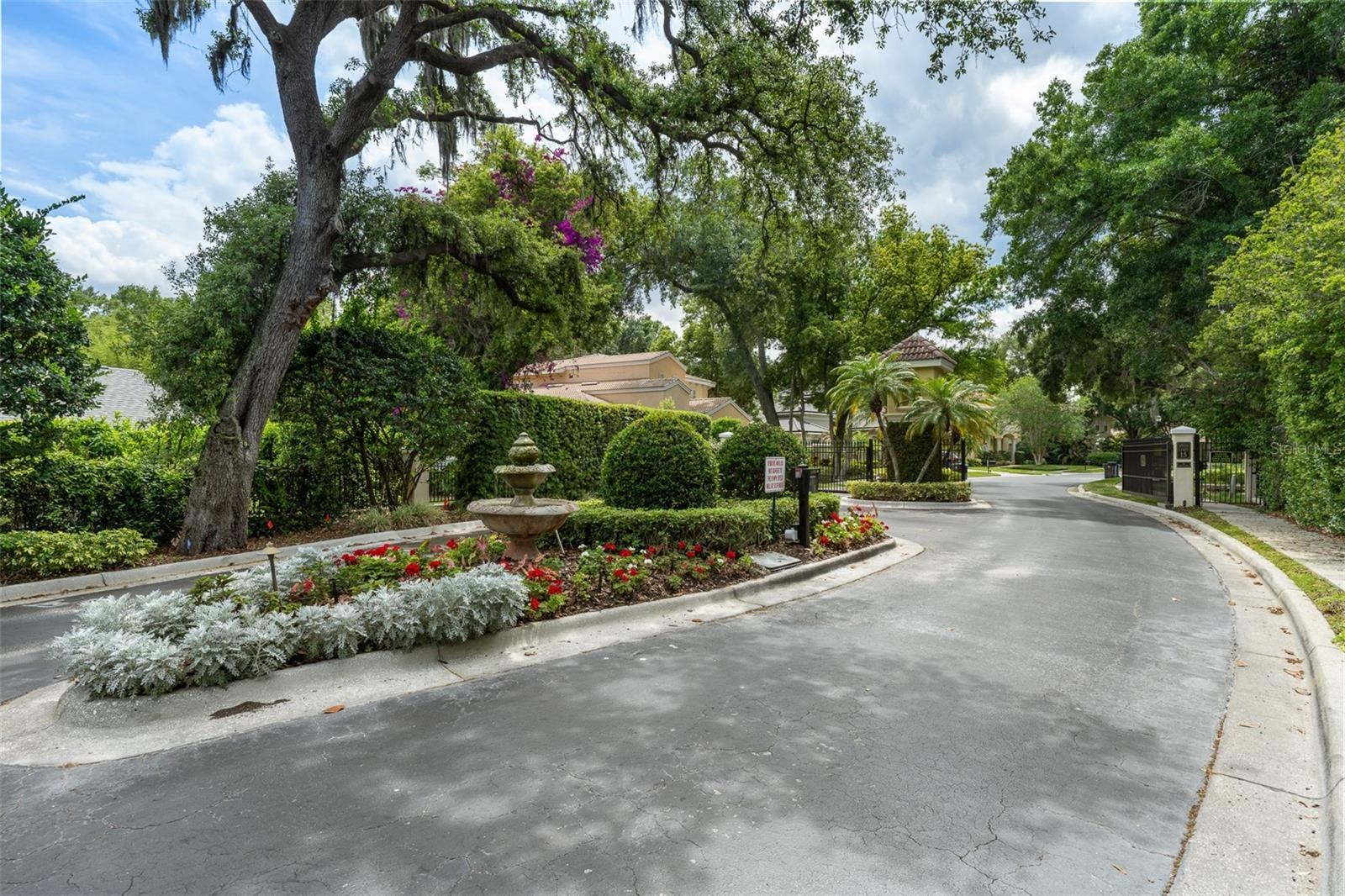 Community entrance — Landscaped gated community entrance.
