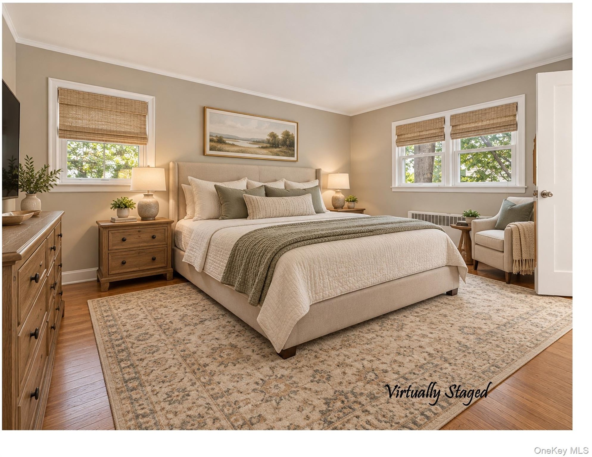 The first floor Primary Bedroom features original hardwood floors, 2 closets, and private bathroom.