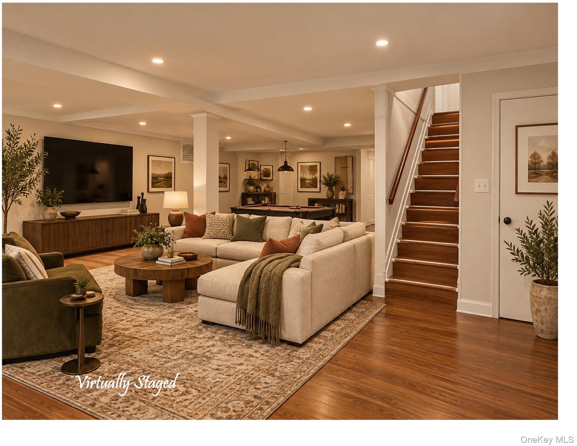 In the lower level, there you'll find roughly 900 additional SF, suitable for Family Room, Recreation Room, Playroom... or whatever you can imagine!