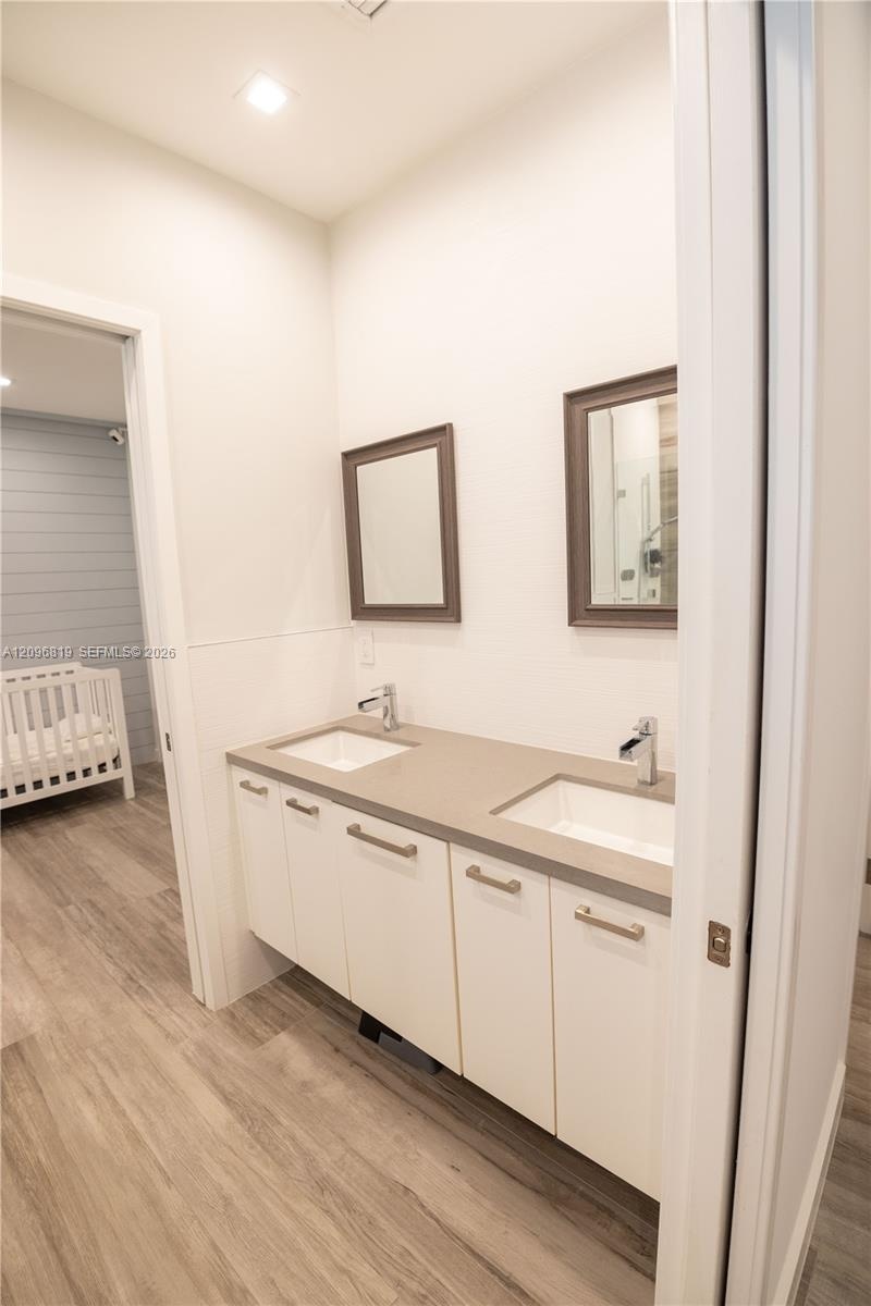 Jack and Jill Bathroom featuring a double vanity