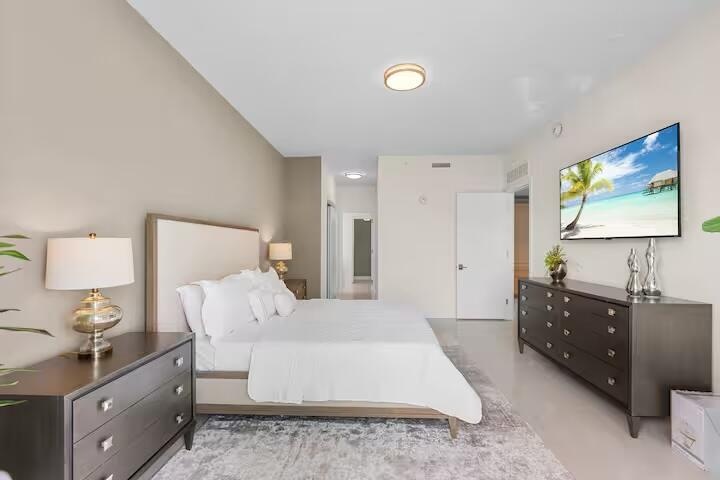 Neutral-toned walls complement the light-colored flooring