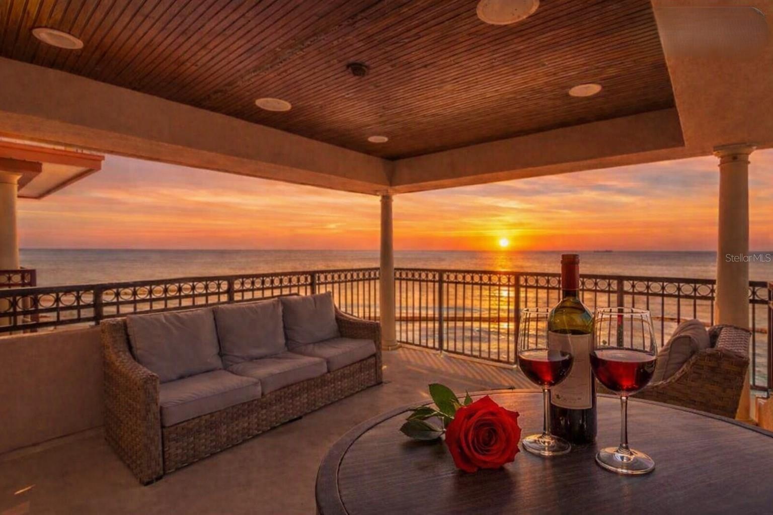“Golden-hour tranquility from your private Gulf-front terrace.”