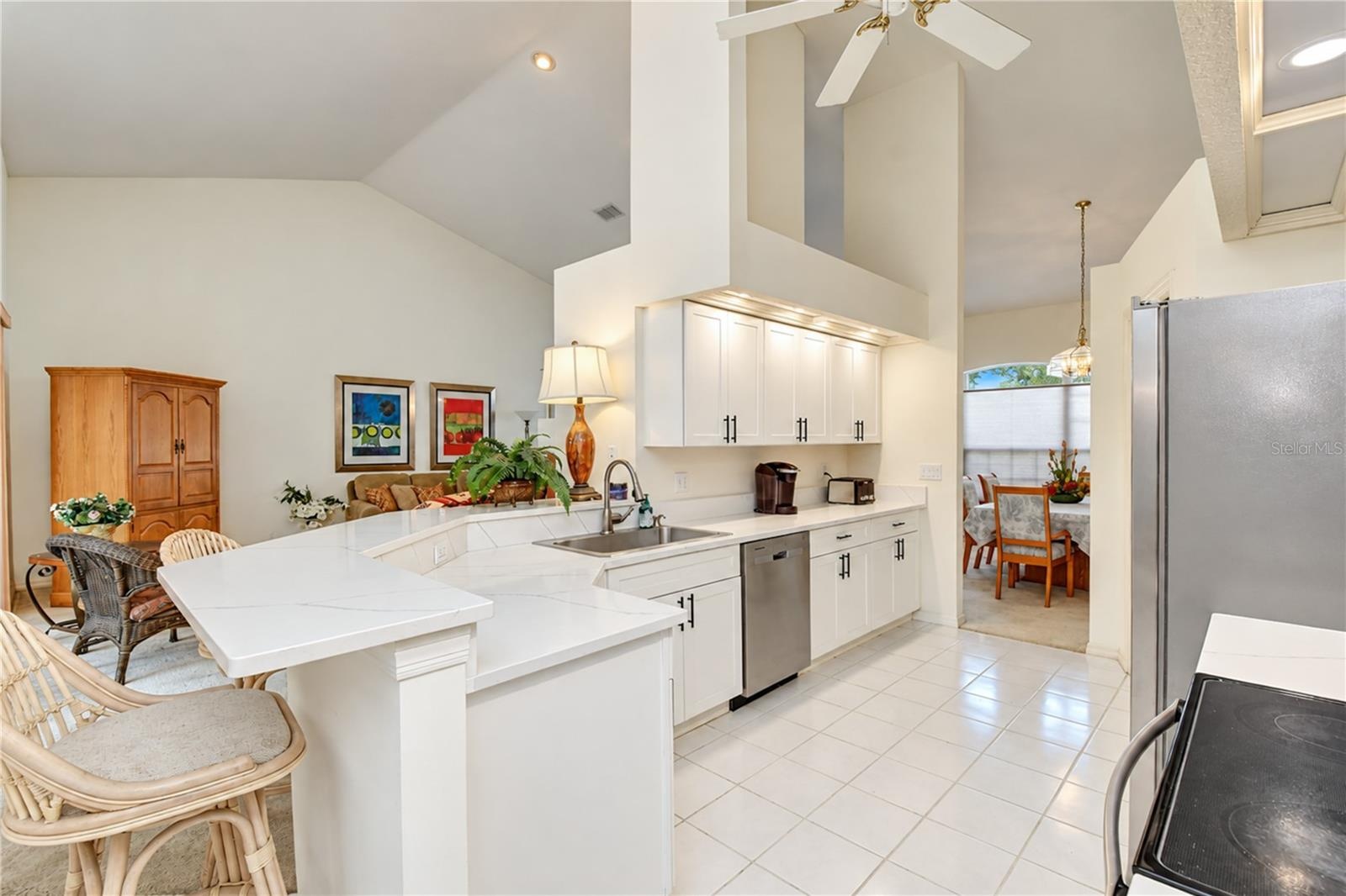 Generous counter space offers room for meal preparation and entertaining.