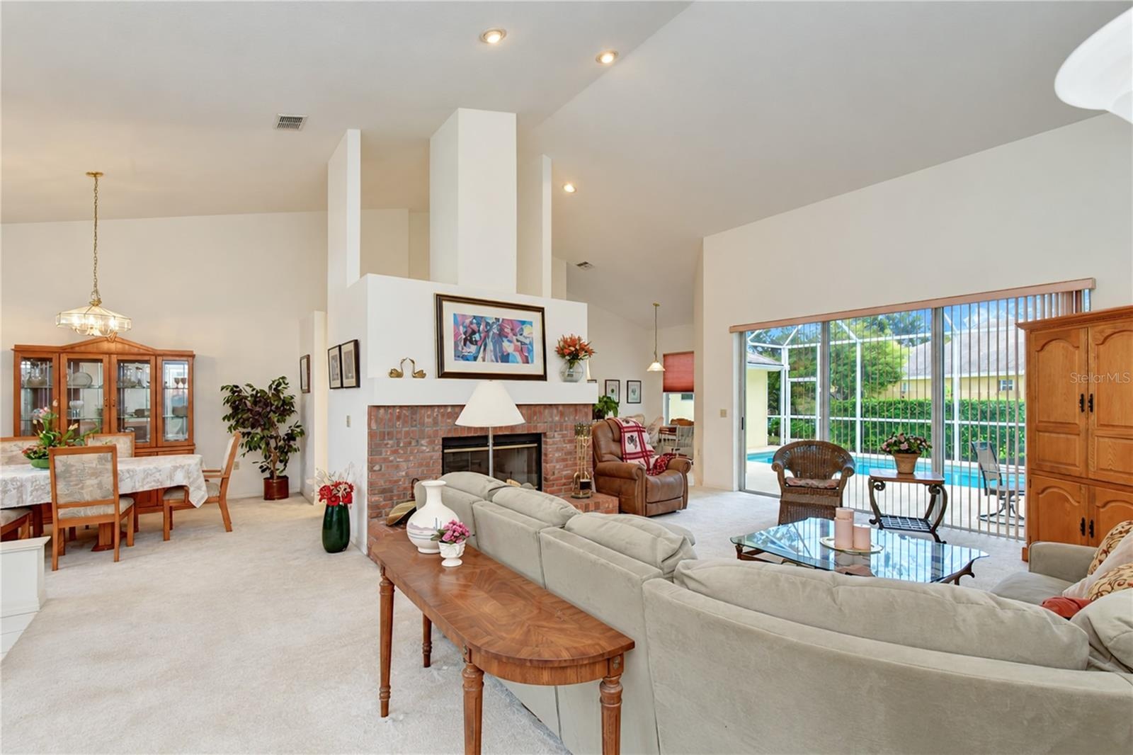 Adjoining dining area provides plenty of space for family meals and entertaining.