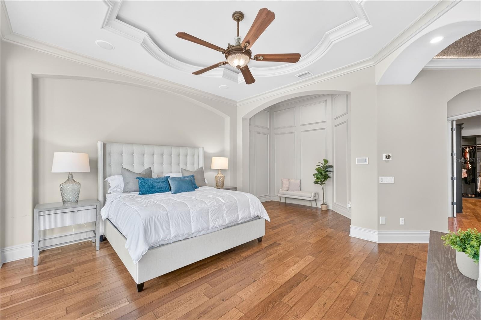 The alcove to the right offers a hidden door to the toilet room for ease.