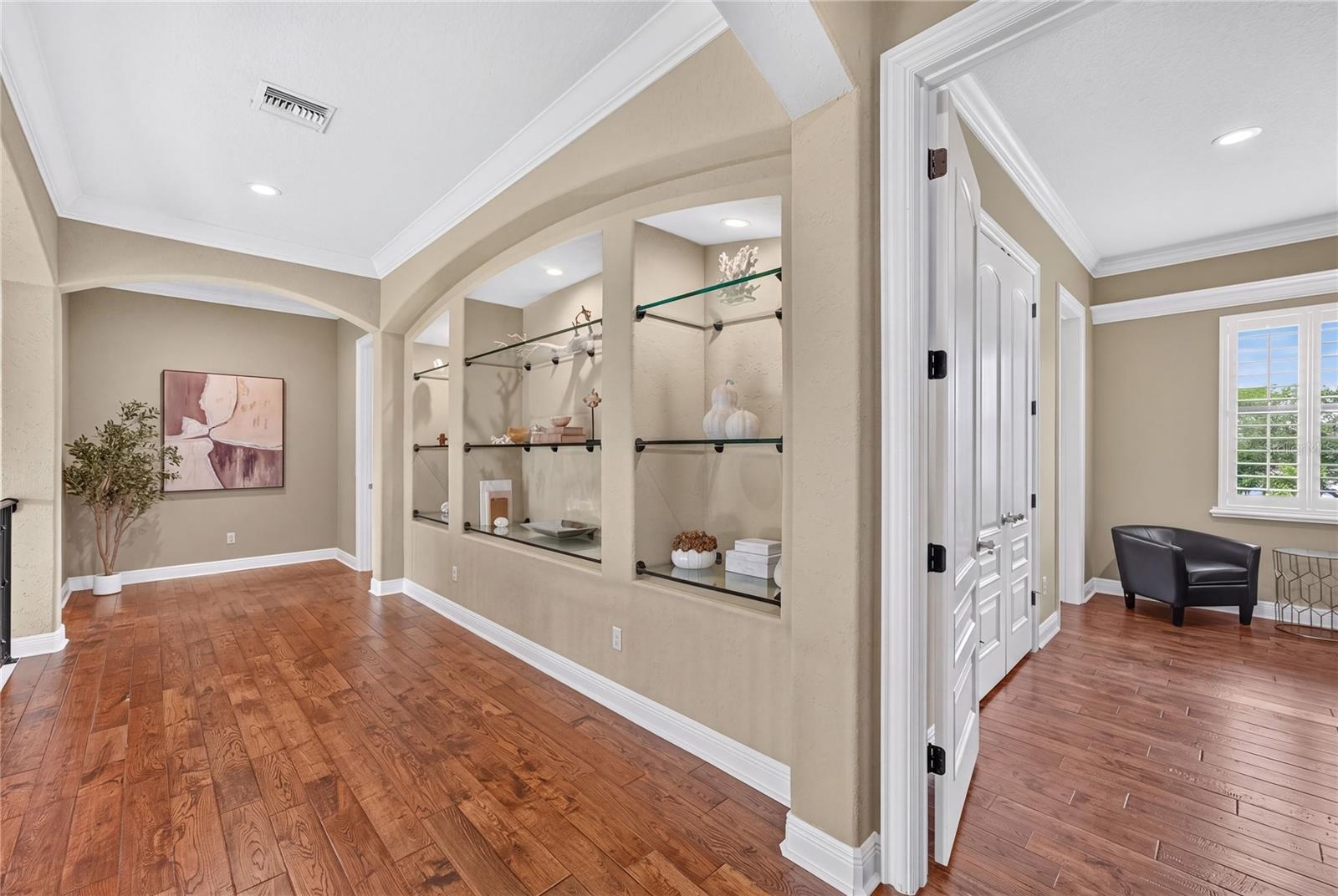 The door to the right leads to front bedroom 5. The door to back right to Bedroom 6, and, not shown here, is the door across the hall from bedroom 6 t