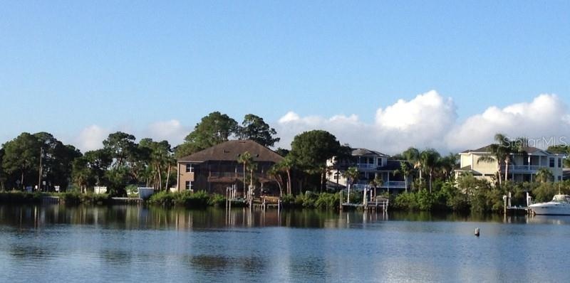 OZONA is a laid-back waterfront community where boating, golf carts, and Gulf Coast living are part of everyday life.