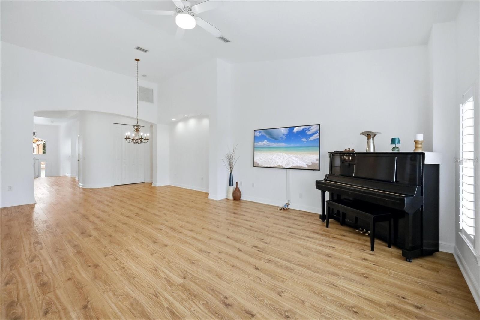 dining space can hold a long or circular table/chairs, open floor plan