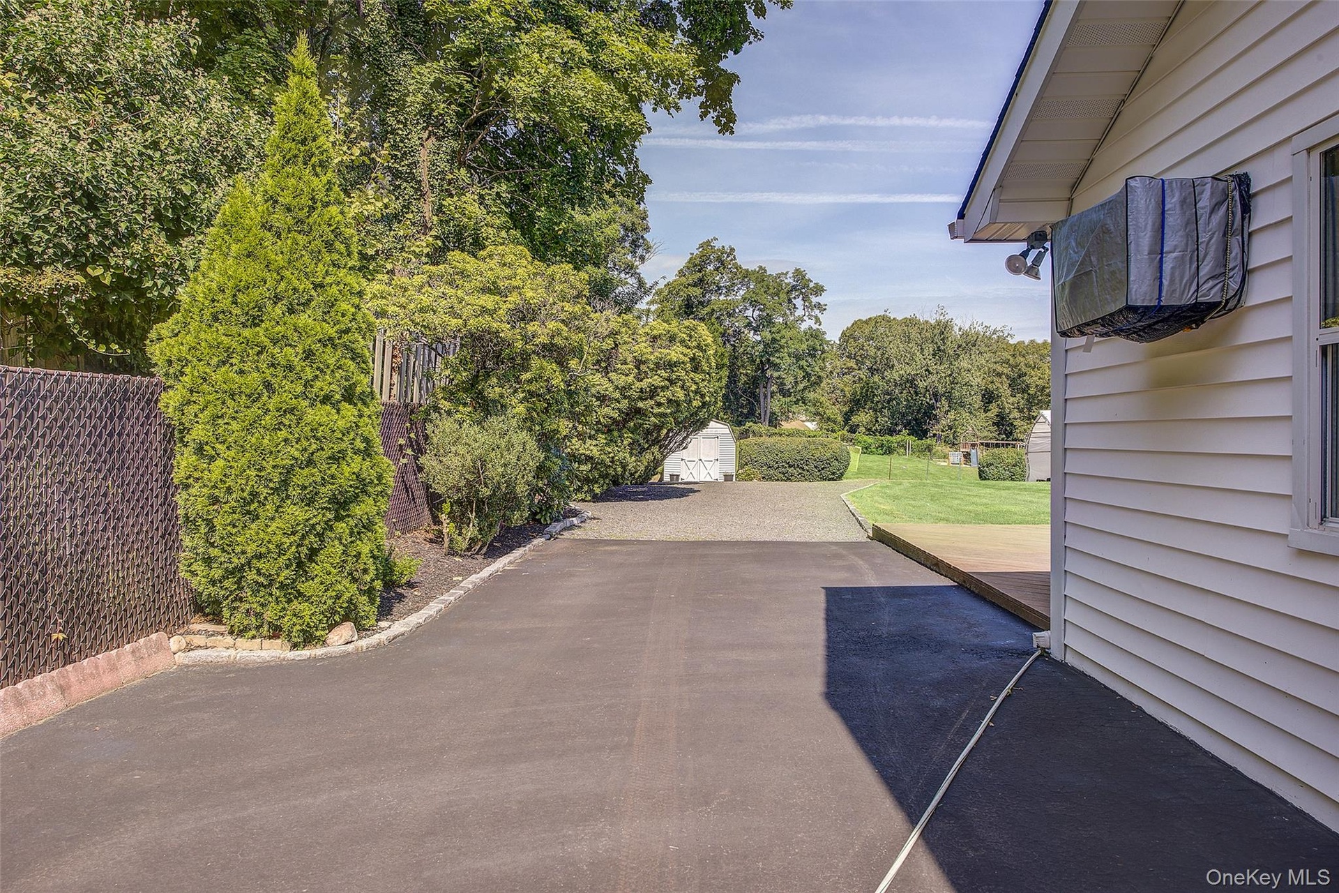 This is the Driveway behind the fence.... where an RV could be stationed!!!