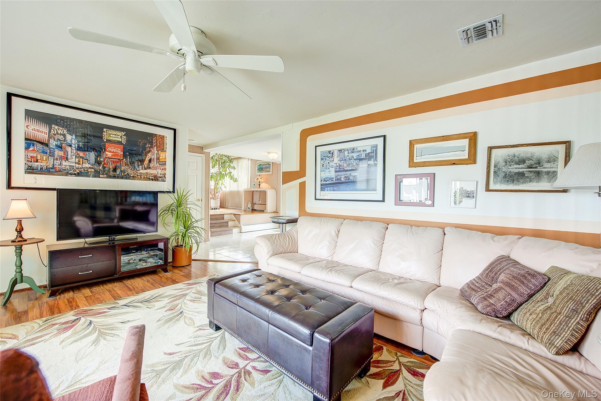 the den from the Fireplace point of view - large furniture  for everyone's lifestyle