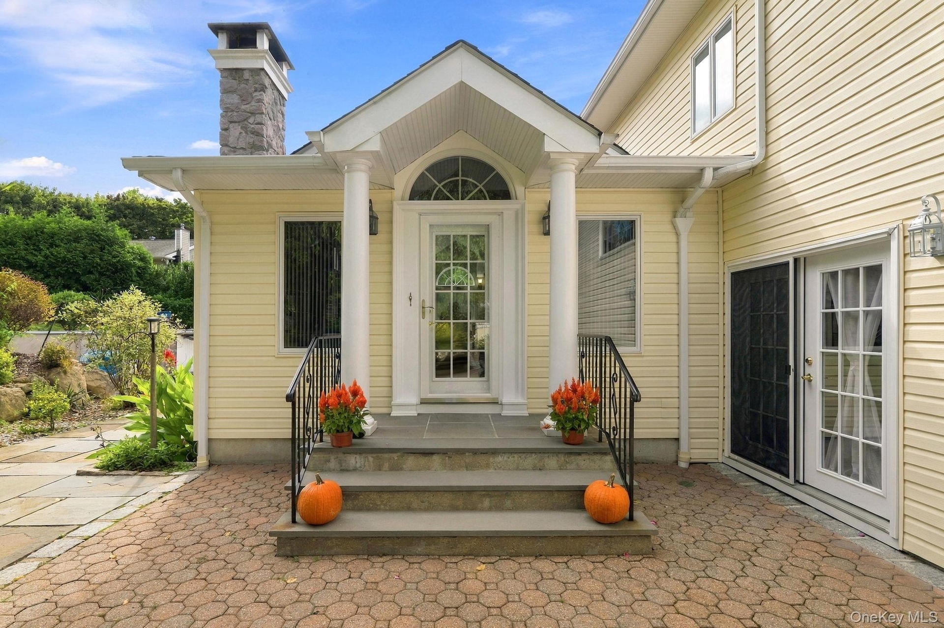A beautifully appointed entrance creates an inviting transition into the kitchen.