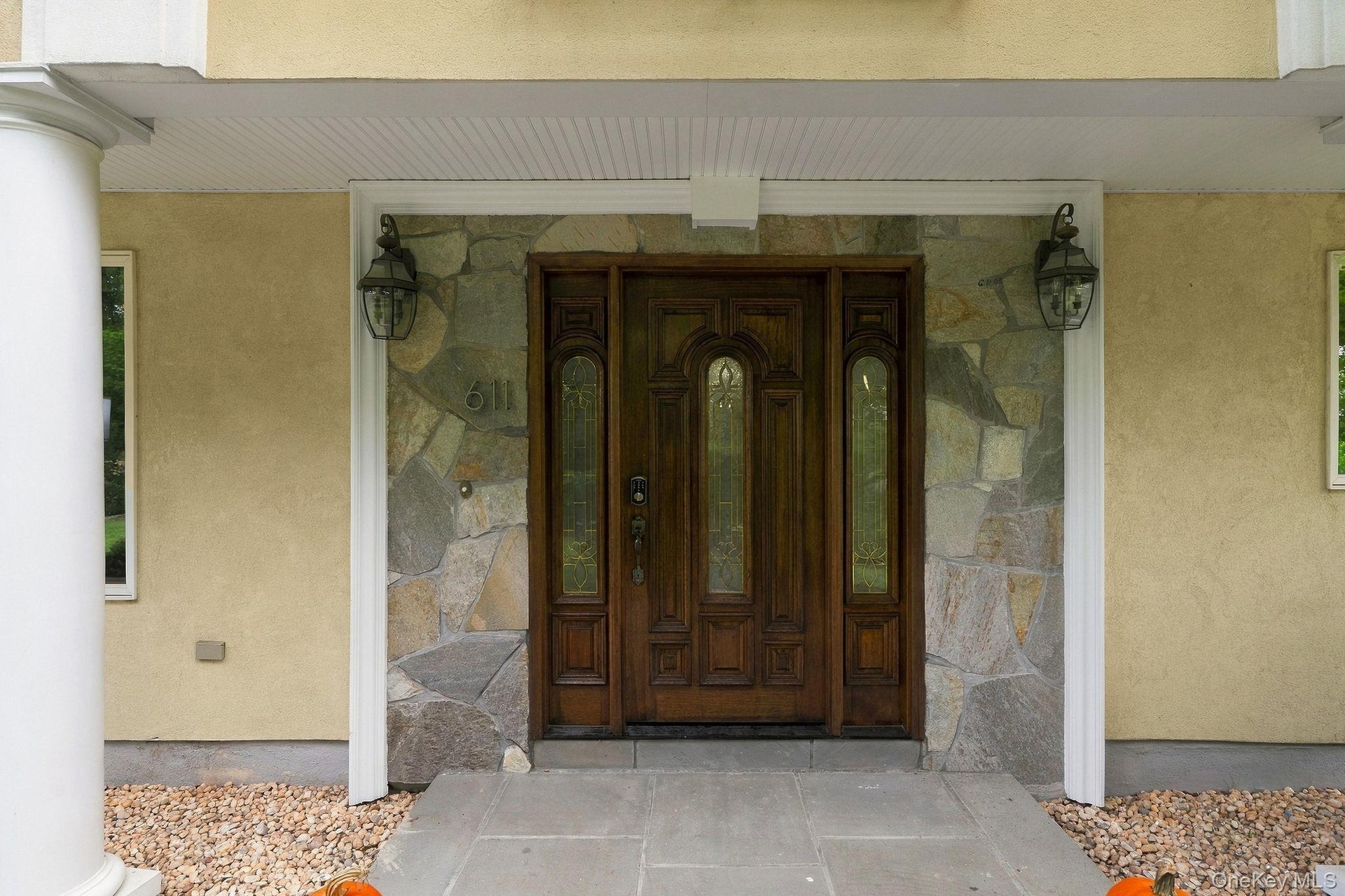 Graceful proportions and architectural details create a commanding first impression.