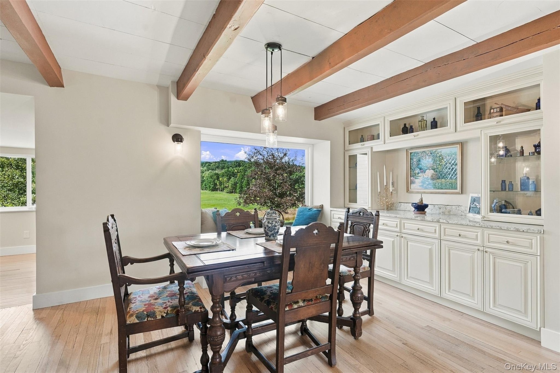 Large picture window seat enjoy the view while eating.