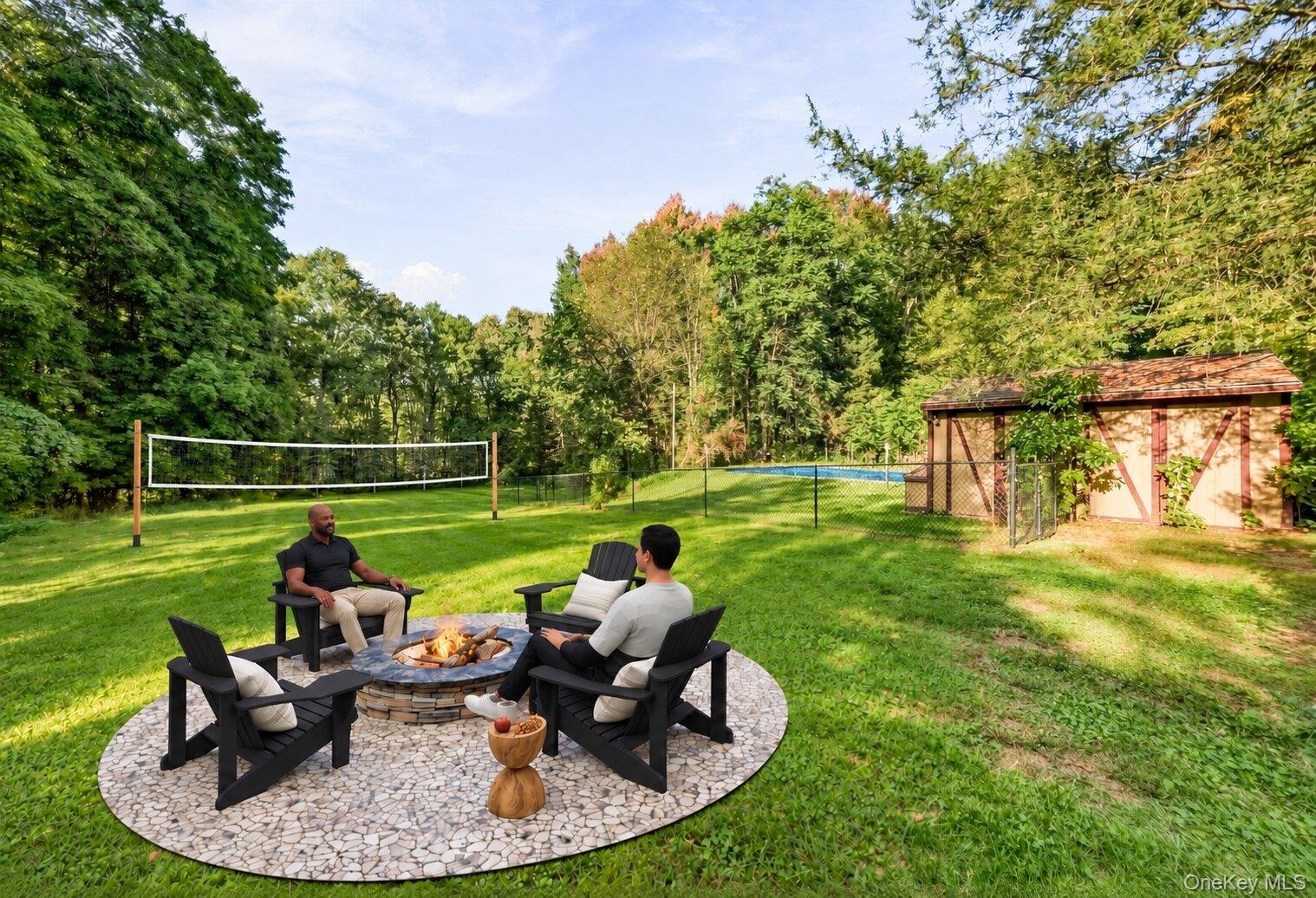 Virtually staged backyard showcasing a fire pit seating area, volleyball space, and the property’s generous lawn.