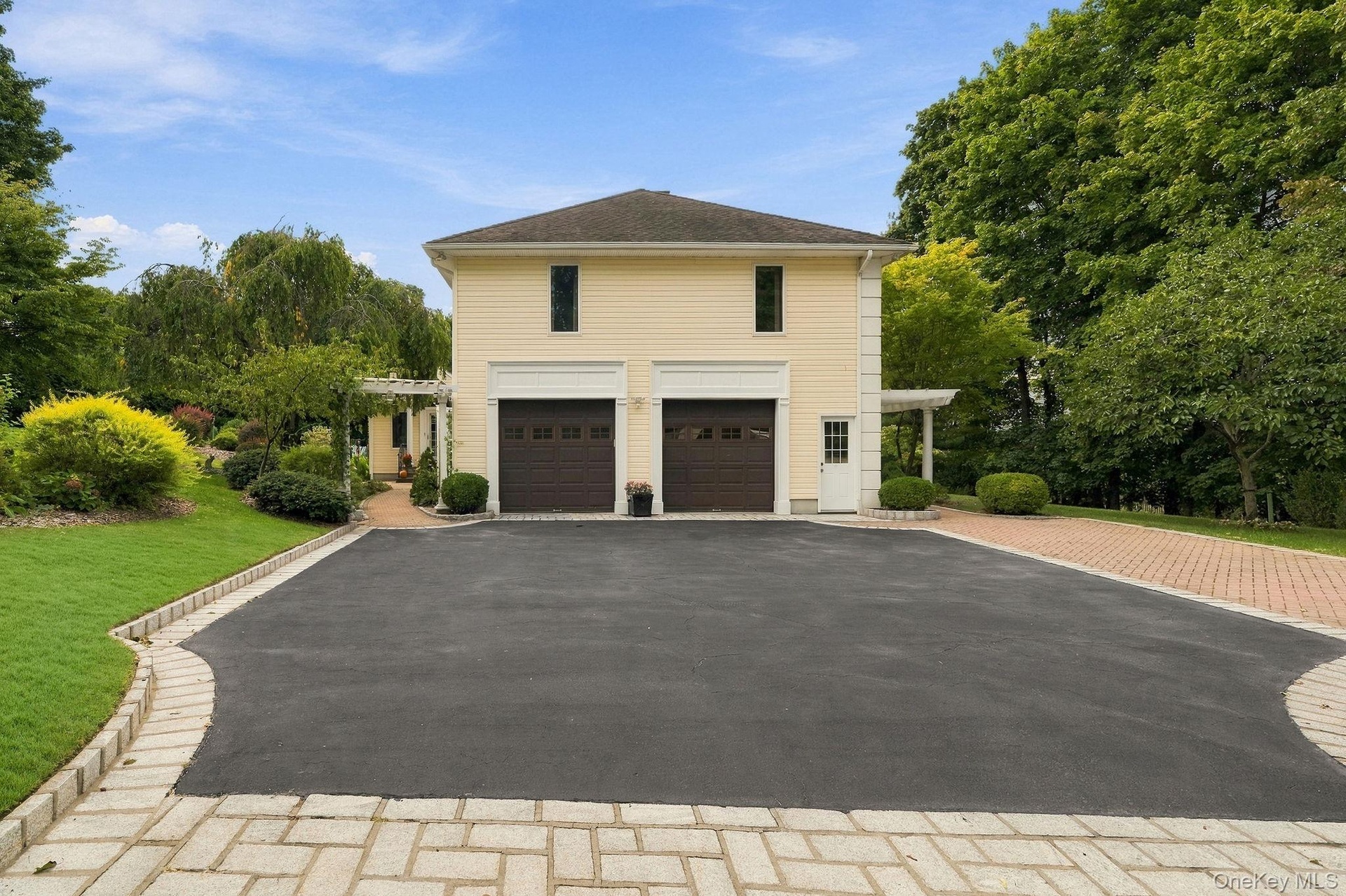 Two-car garage space provides effortless parking and additional storage.