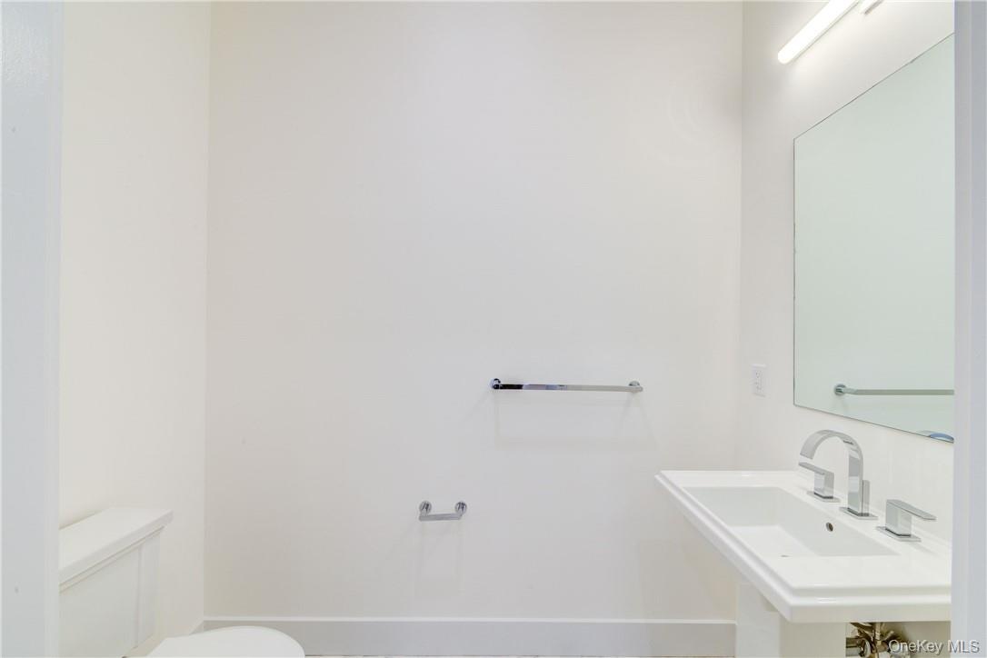 Bathroom with toilet and sink