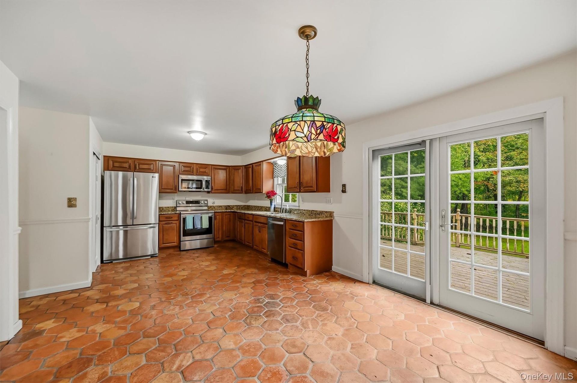 French doors lead to the large composite deck.