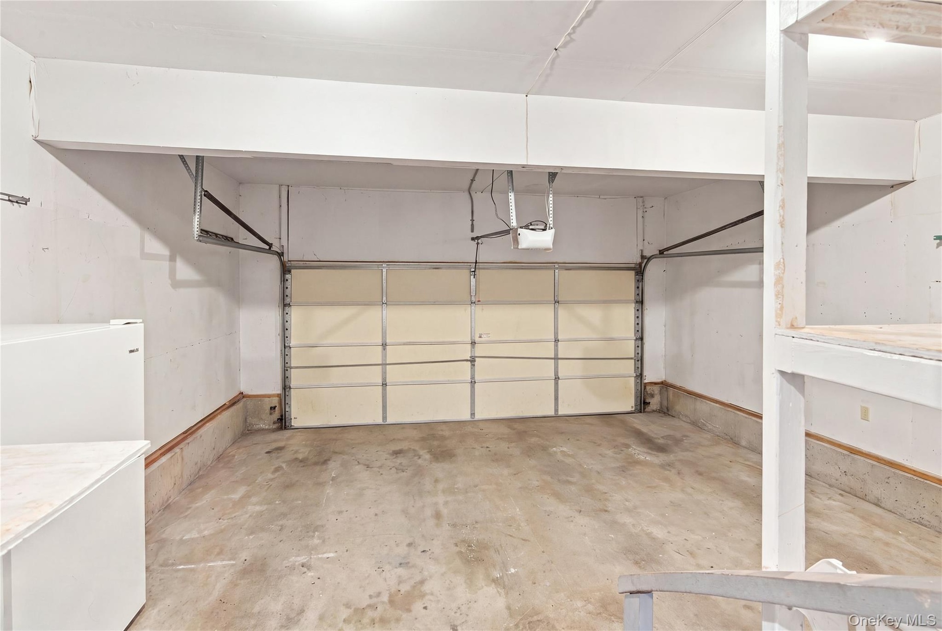 2 car garage - cars and items digitally removed for photo