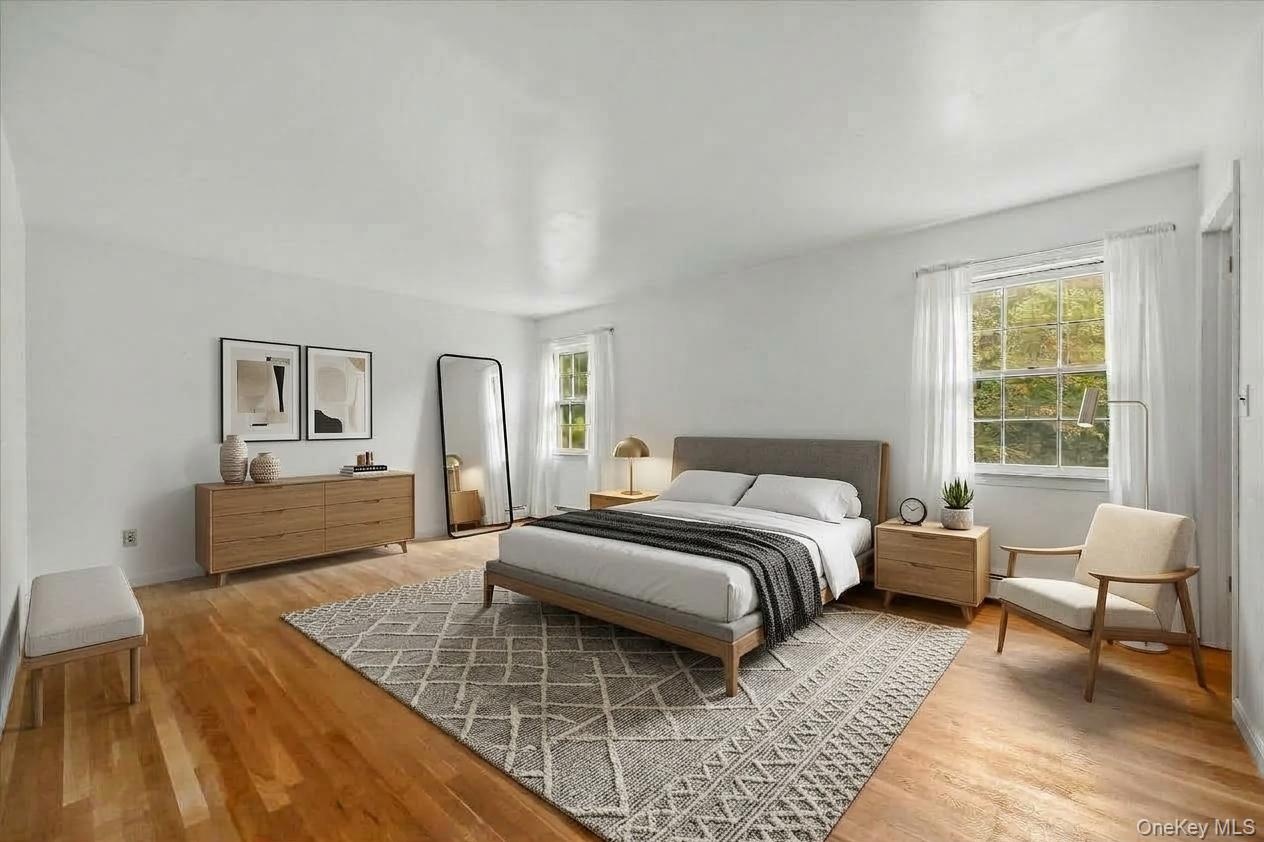 The primary en suite bedroom virtually staged.