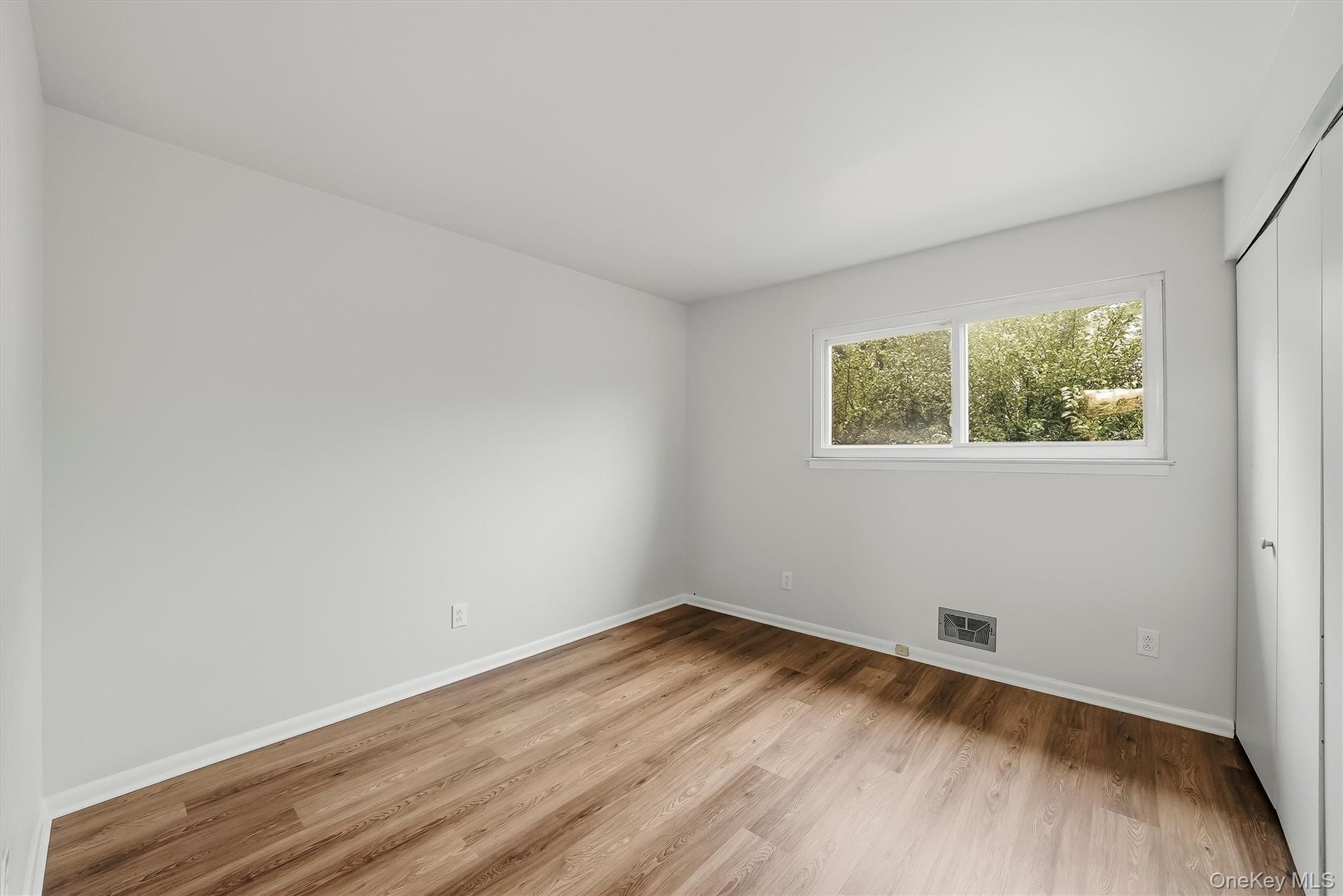 3rd bedroom with brand new floors.