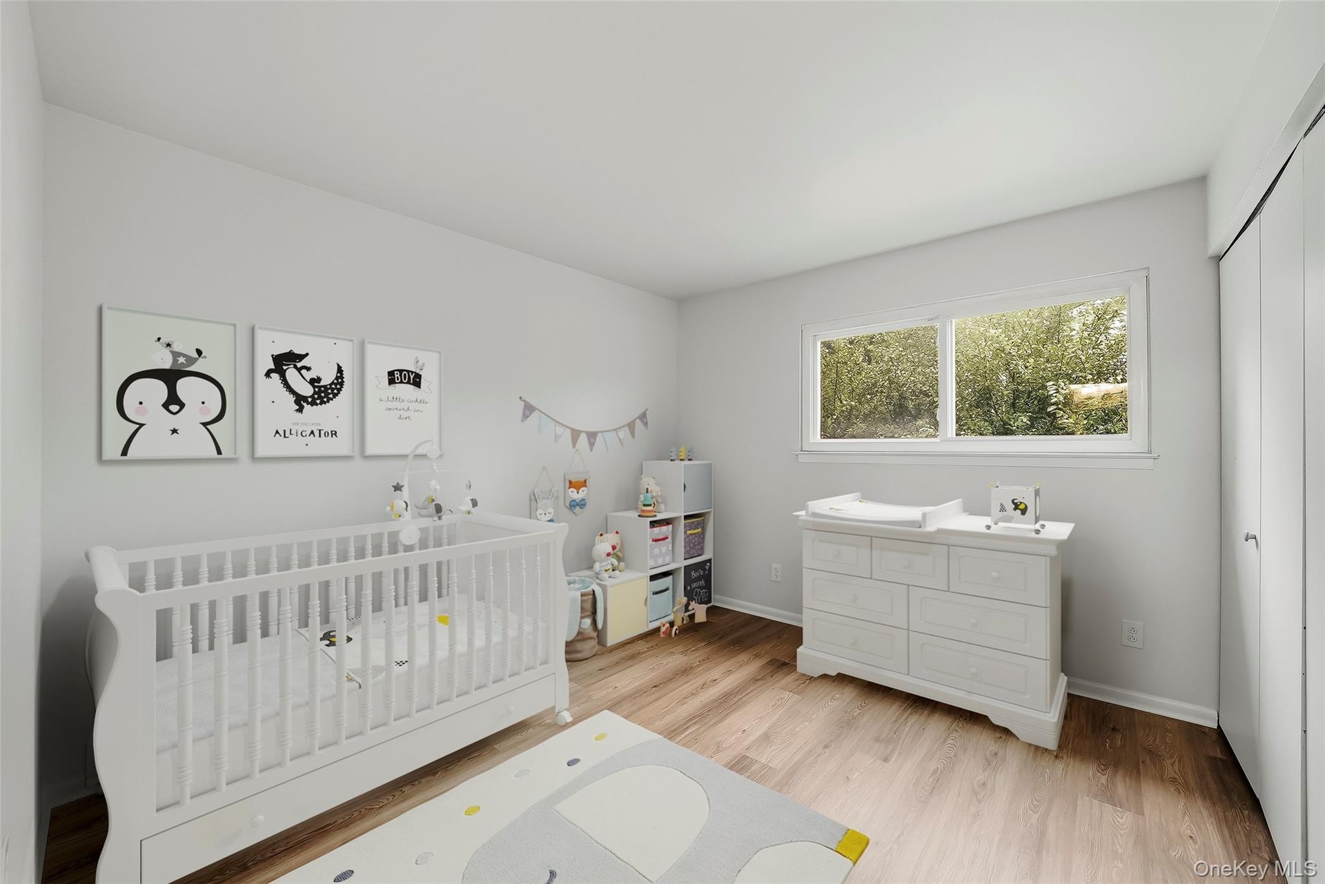 Virtually staged 3rd bedroom with brand new floors.