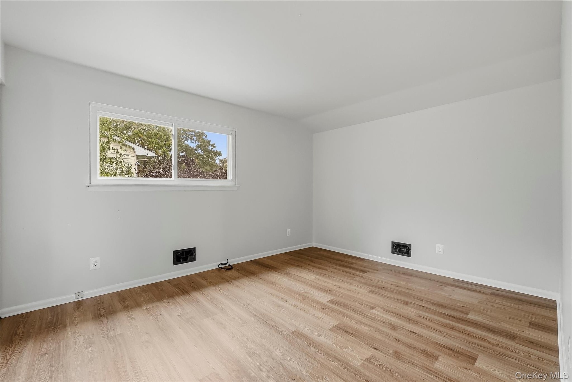 2nd bedroom with brand new floors.