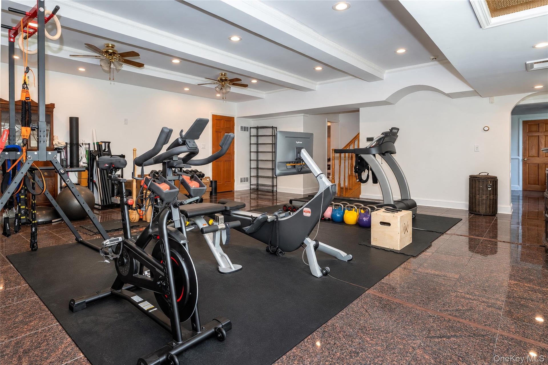 Basement is Currently being used as a full service gym with bathroom and dry sauna.