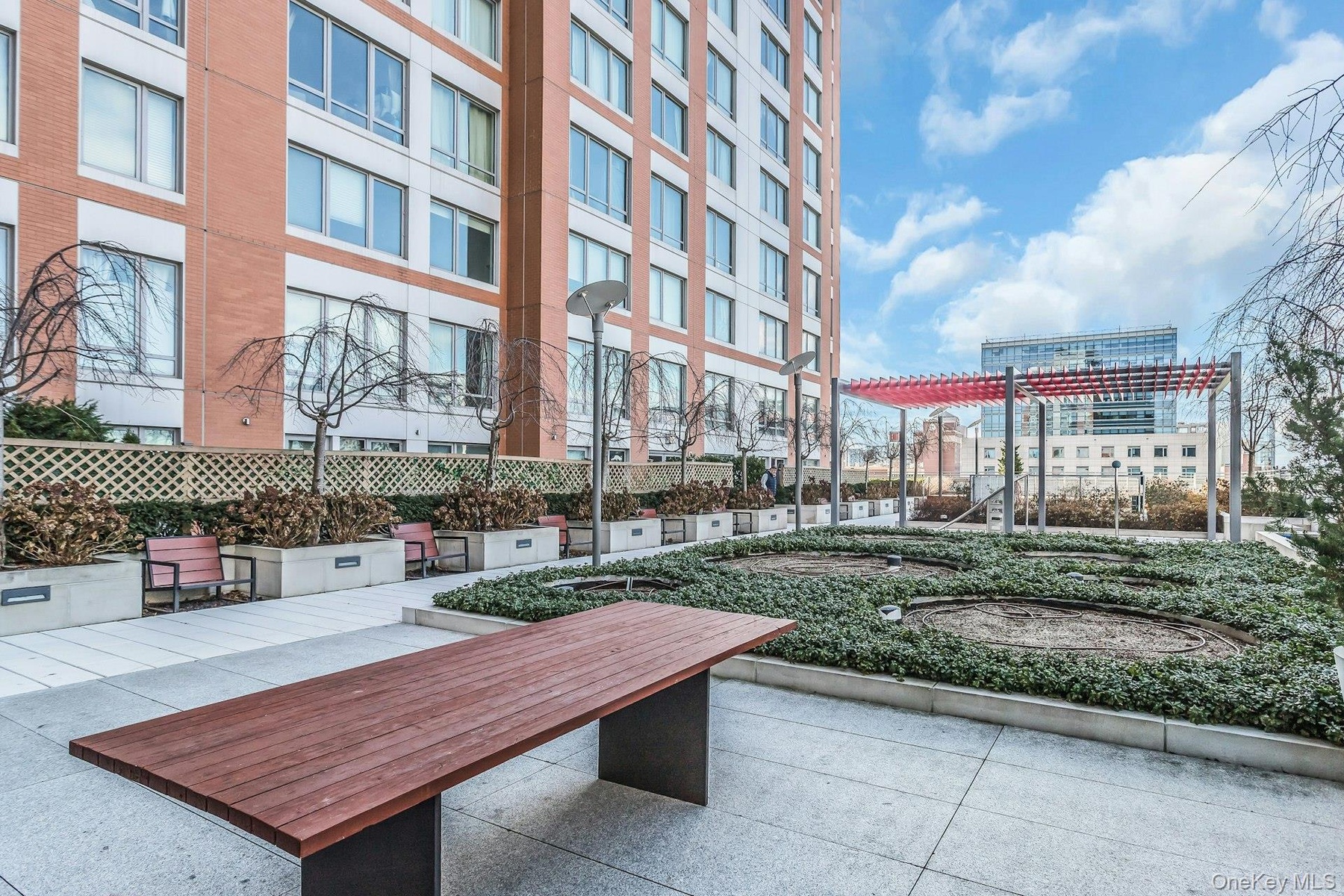 View of home's community with a patio area