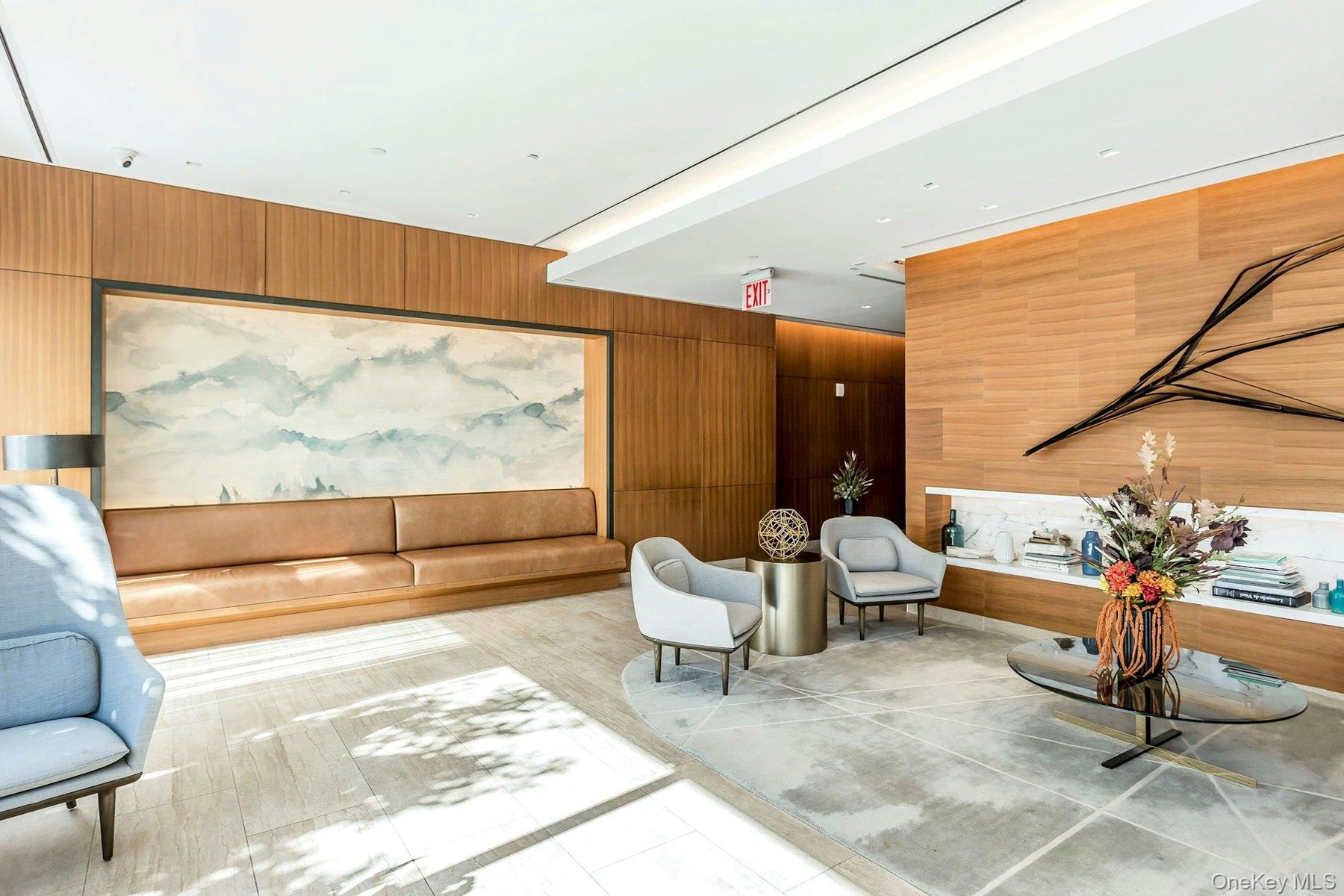 Community lobby featuring wood walls