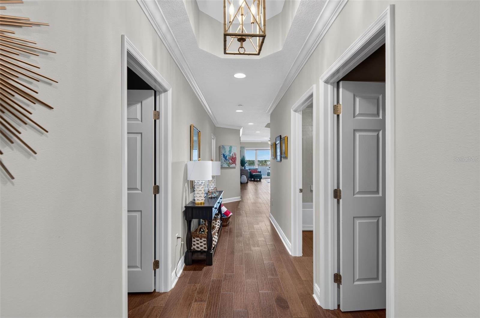 Entry hall with guest bedroom on either side