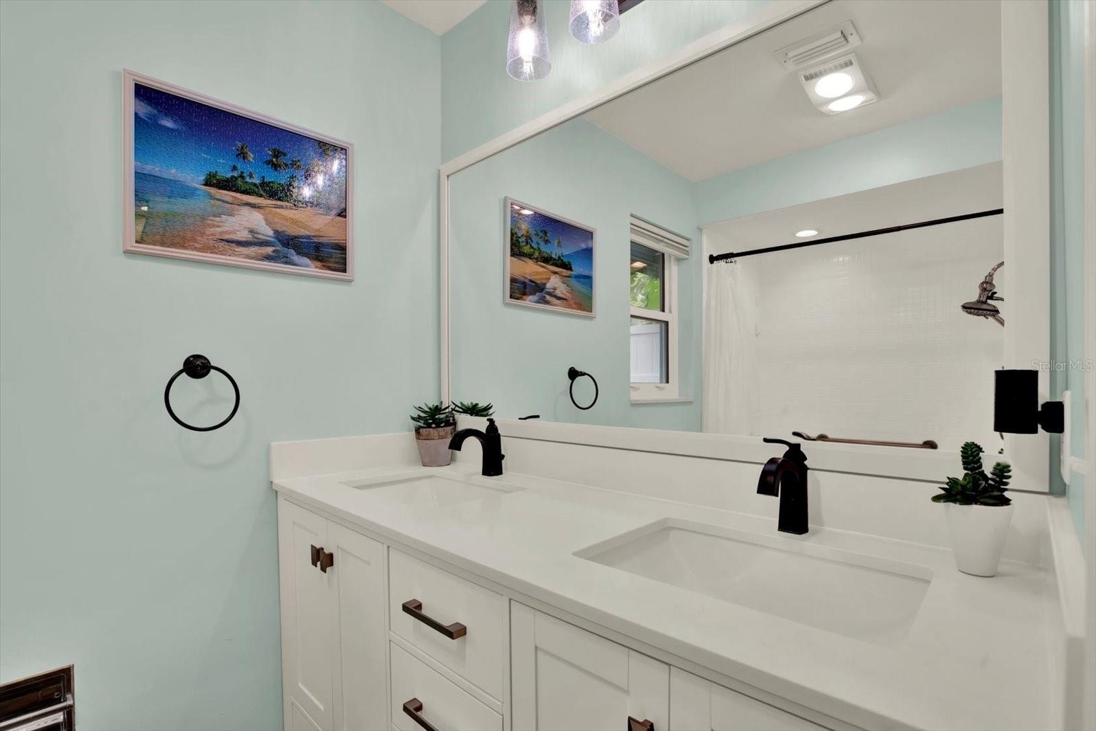 Primary bathroom with dual sink vanity