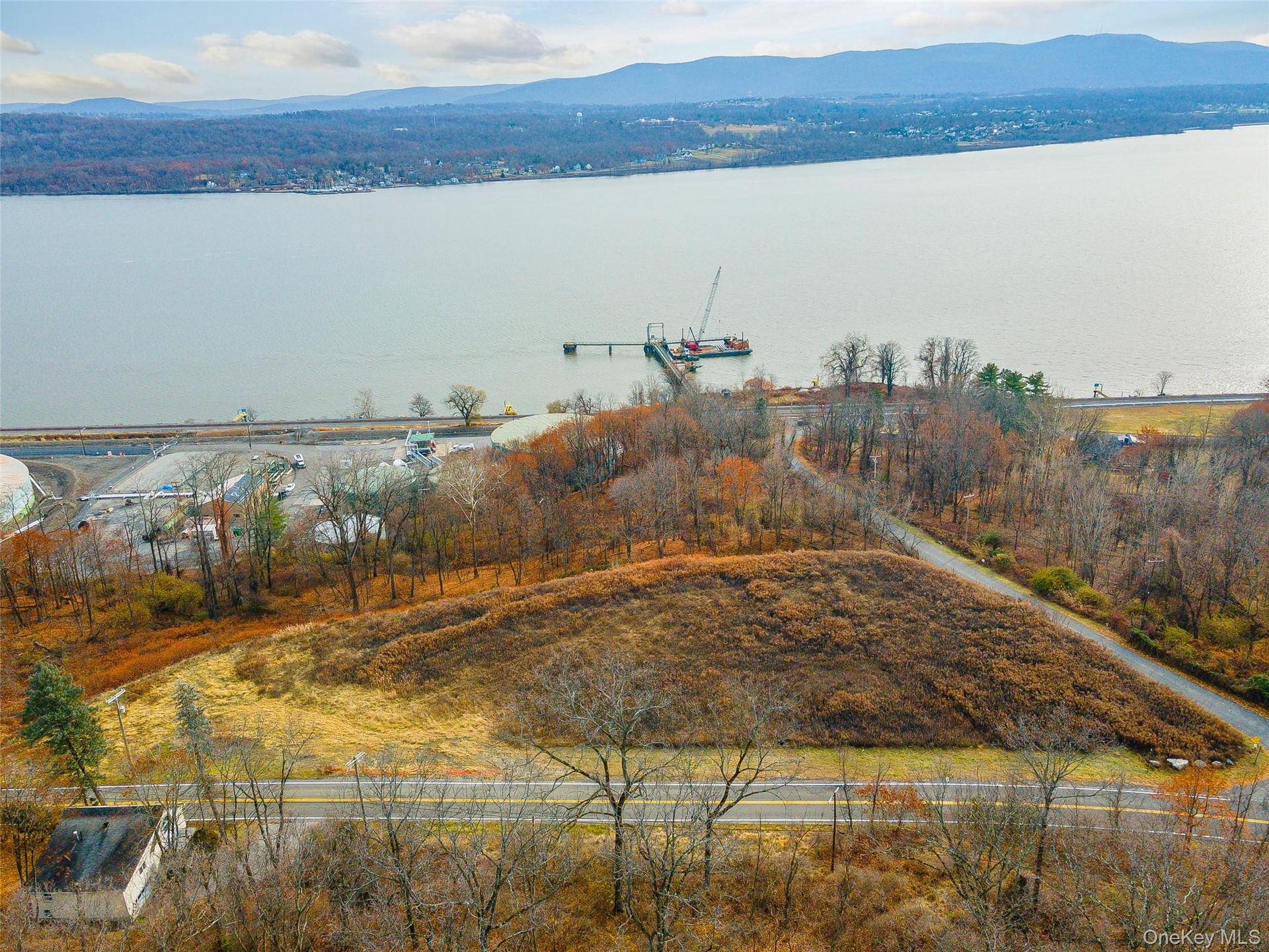 Aerial view with a water and mountain view