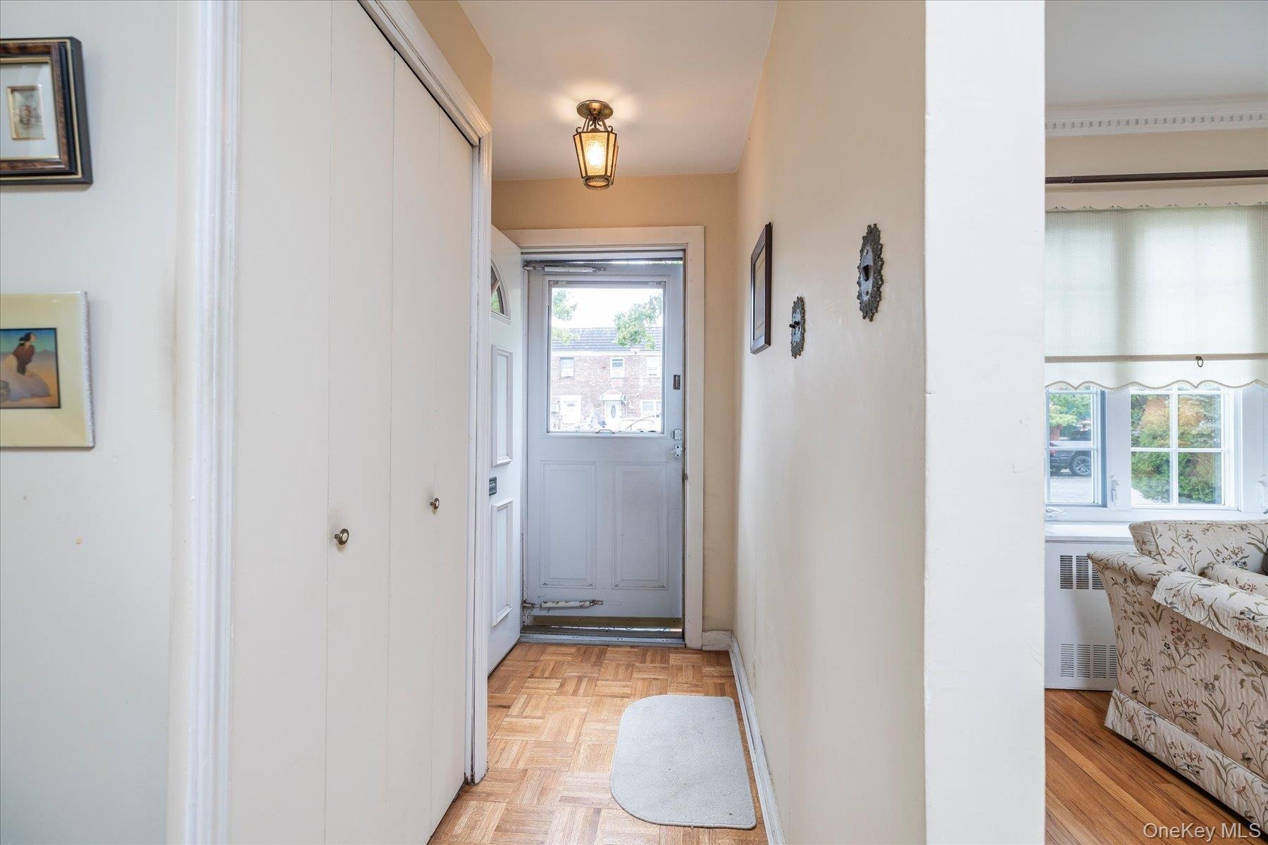 Entry hallway with closet