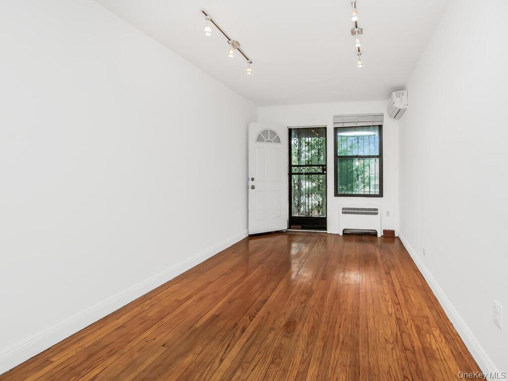 Downstairs one bedroom with access to yard